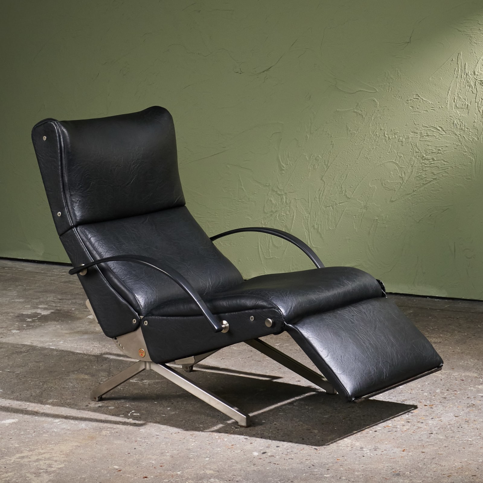 Osvaldo Borsani, 'P40' Lounge Chair in Stainless Steel and Black Faux Leather, Tecno, Italy, 1950s