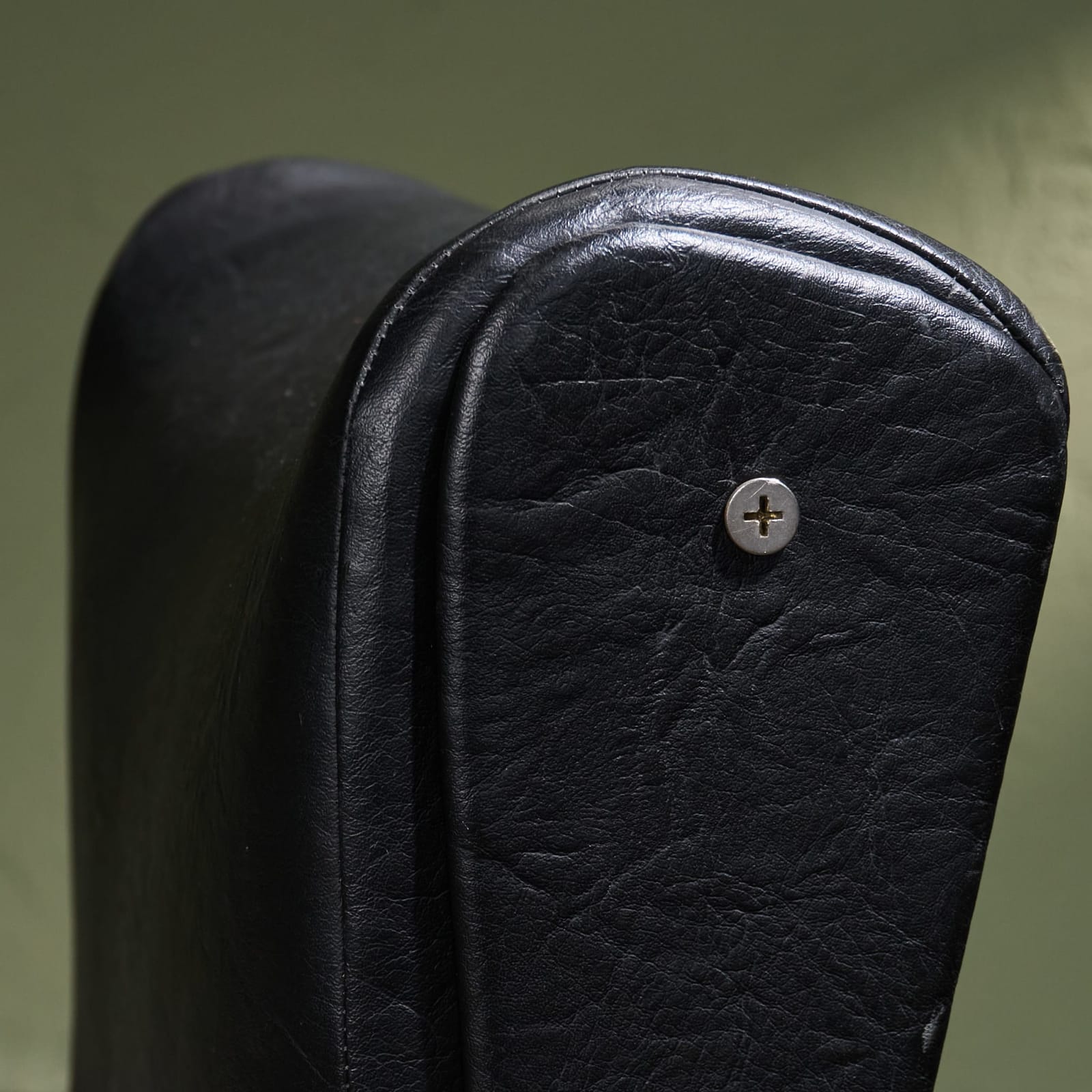 Osvaldo Borsani, 'P40' Lounge Chair in Stainless Steel and Black Faux Leather, Tecno, Italy, 1950s