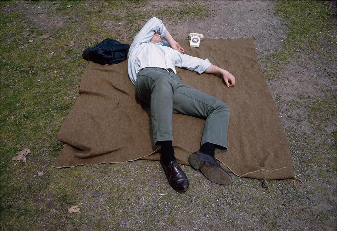 Joel Meyerowitz, Man asleep on blanket with tiny telephone, New Jersey (1965), 2020