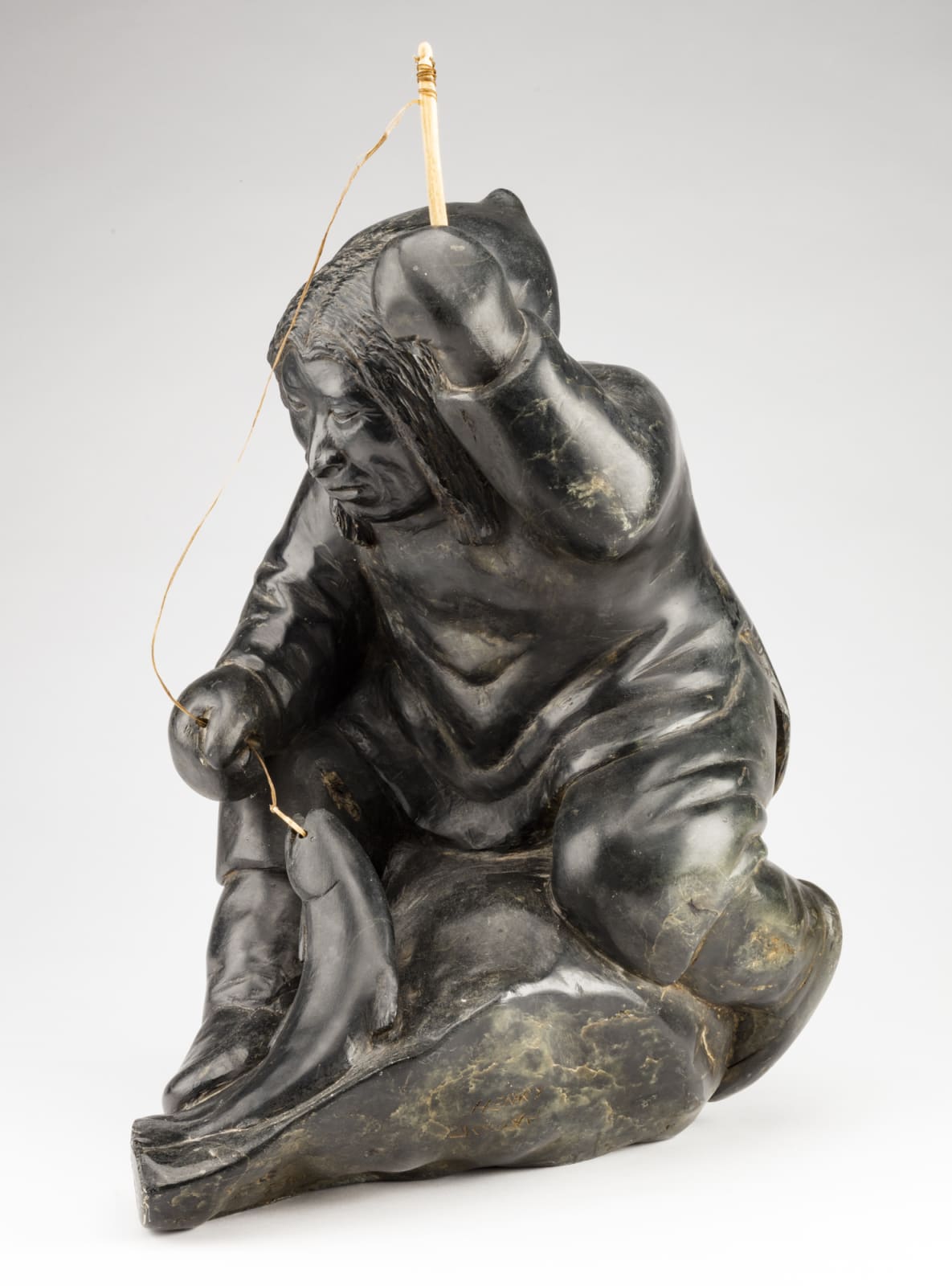 HENRY EVALUARDJUK (1923-2007) IQALUIT (FROBISHER BAY), Fisherman, c. 1963-4