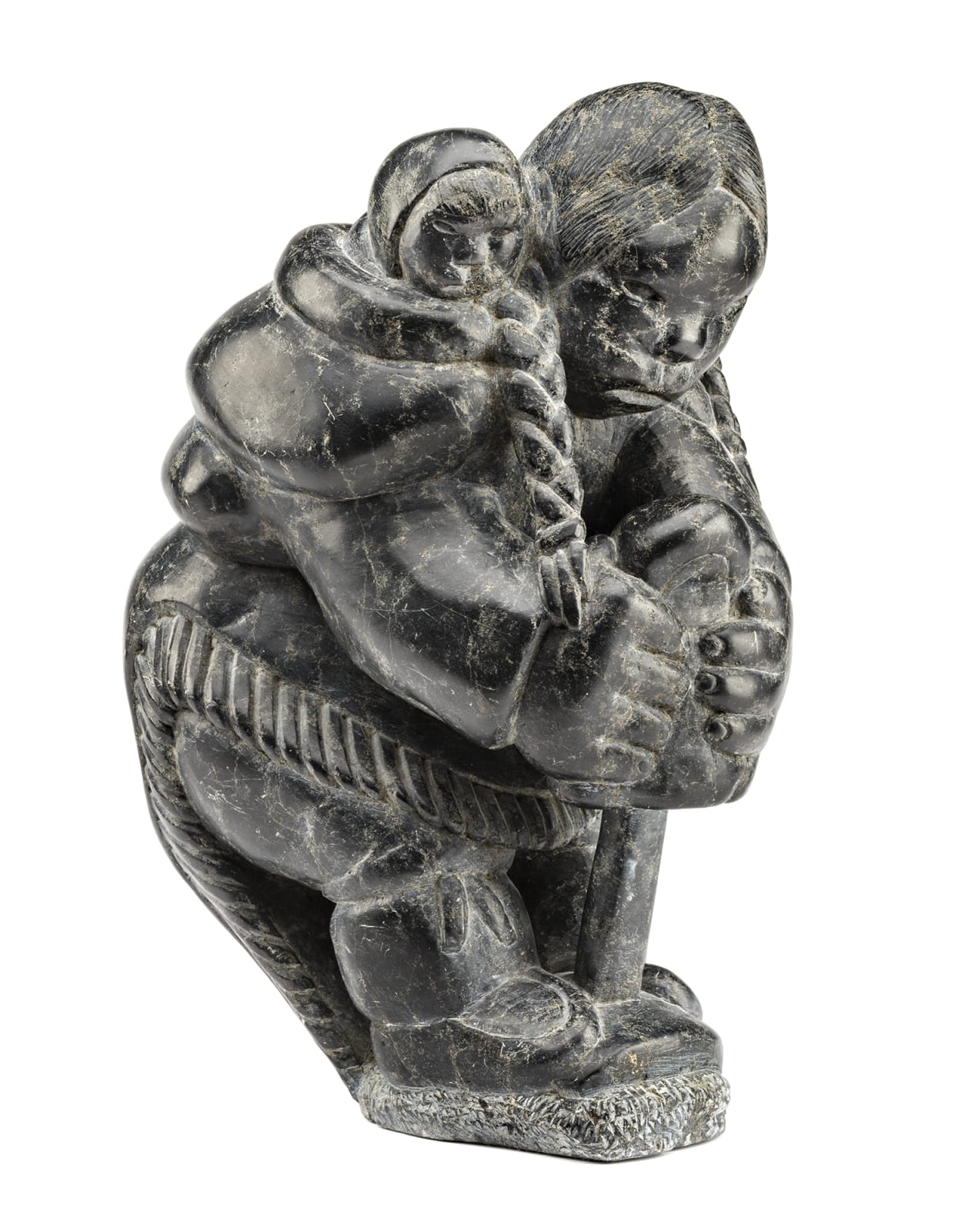 JOHNNY INUKPUK, R.C.A. (1911-2007) INUKJUAK (PORT HARRISON), Mother with Child, Stretching a Kamik, early 1960s