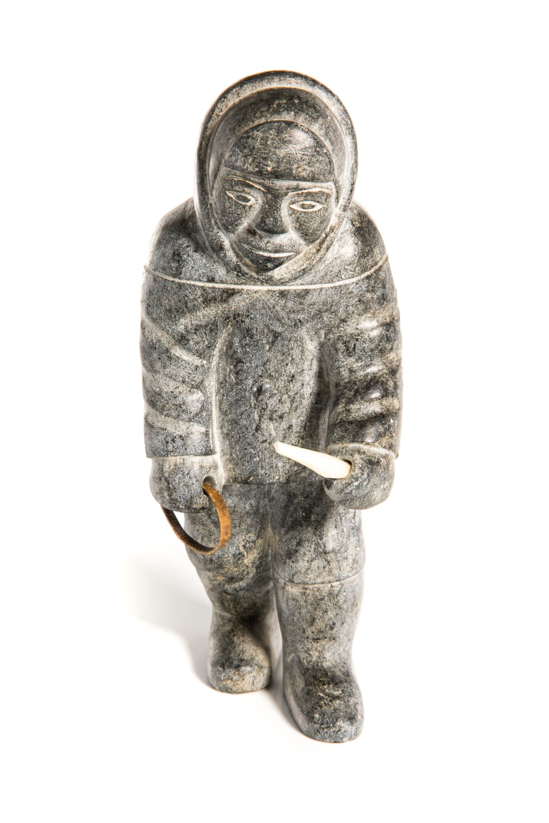 MAKUSI QALINGU ANGUTIKIRQ (1899-1986) PUVIRNITUQ (POVUNGNITUK), Inuk with Heavy Pack, early-mid 1960s