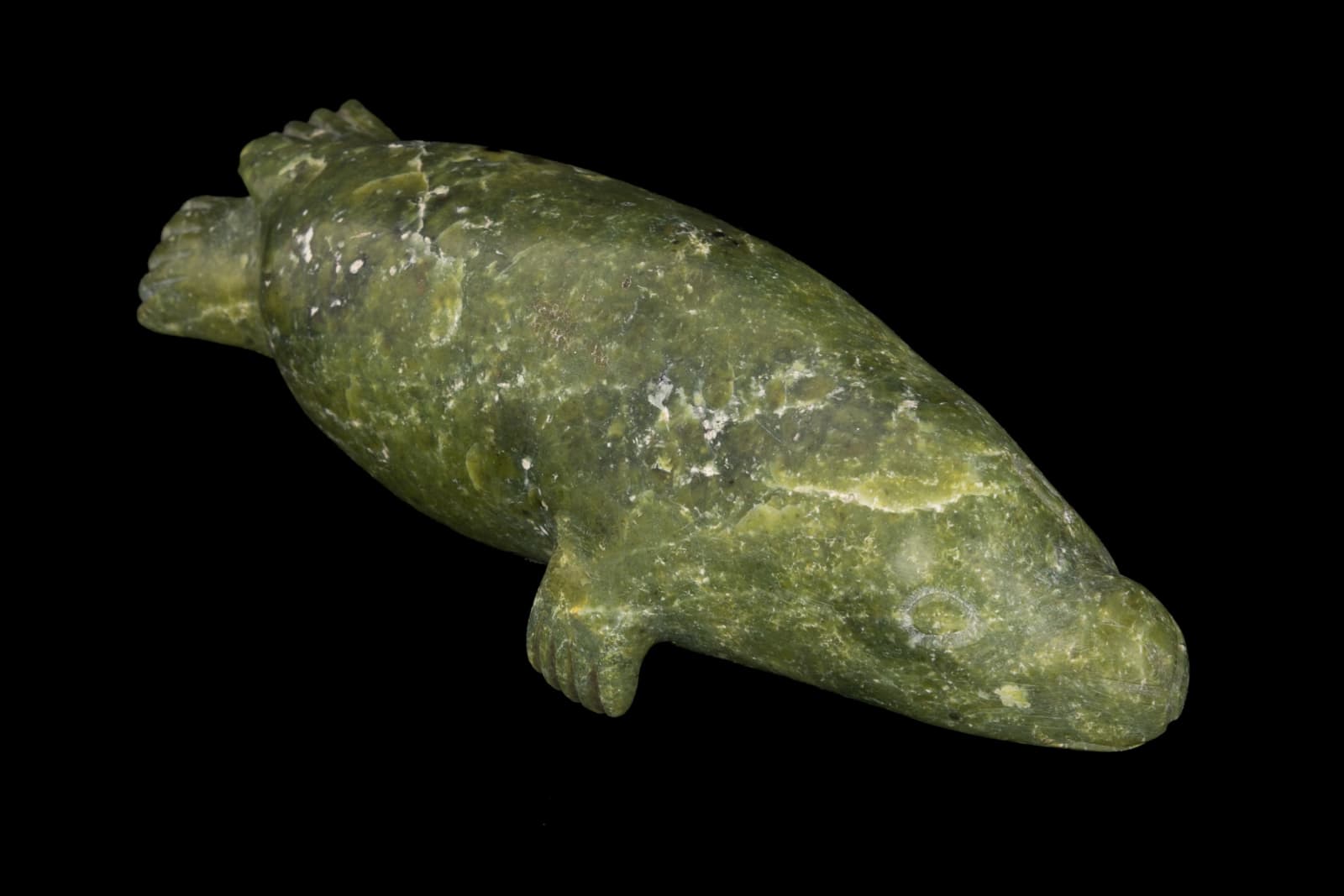 KEELEEMEEOOMEE SAMUALIE (1919-1983) KINNGAIT (CAPE DORSET), Swimming Seal, 1980s