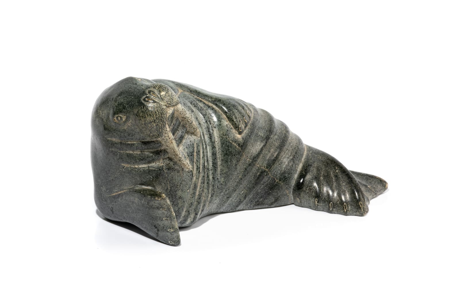 LEVI QUMALUK (1919-1997) PUVIRNITUQ (POVUNGNITUK), Basking Walrus