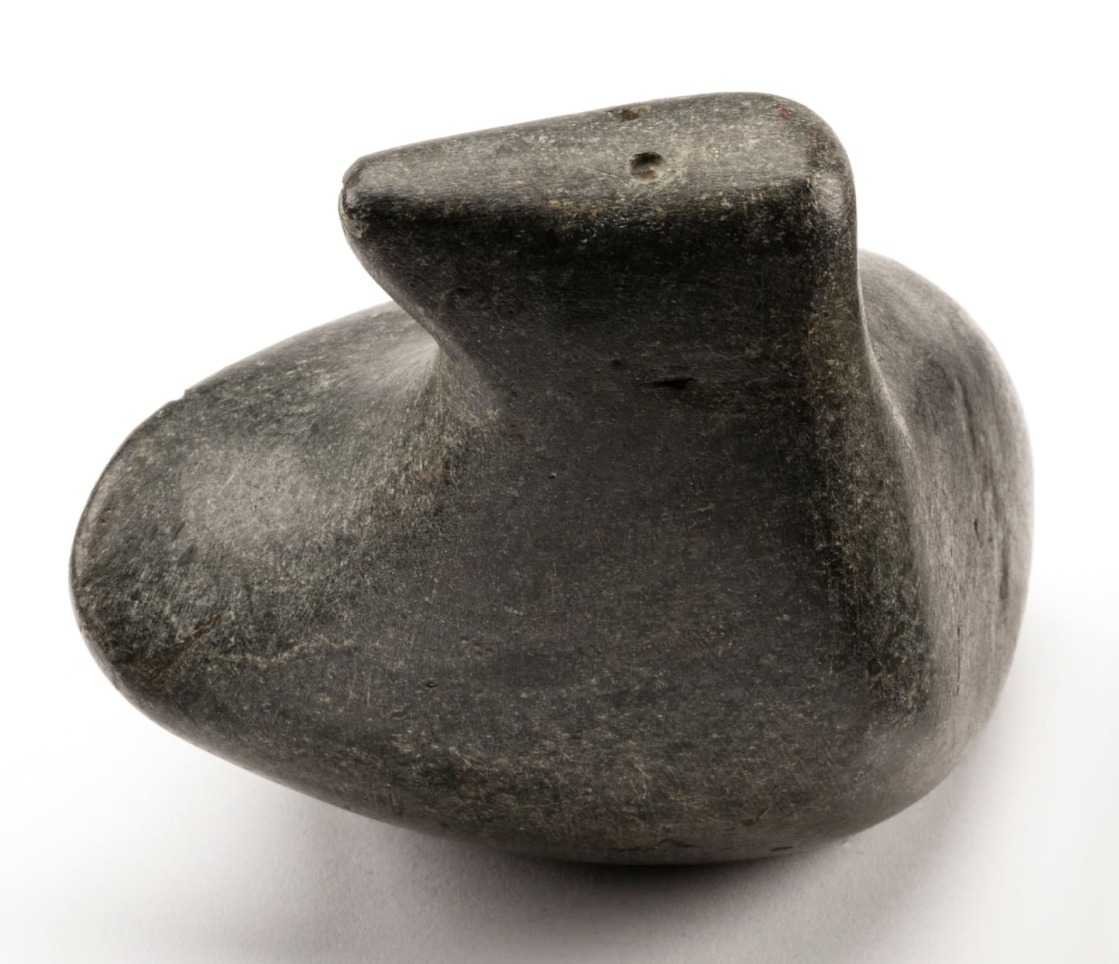 ANDY MIKI (1918-1983) ARVIAT/TIKIRAQJUAQ (ESKIMO POINT/WHALE COVE), Resting Seal, c. 1965-68