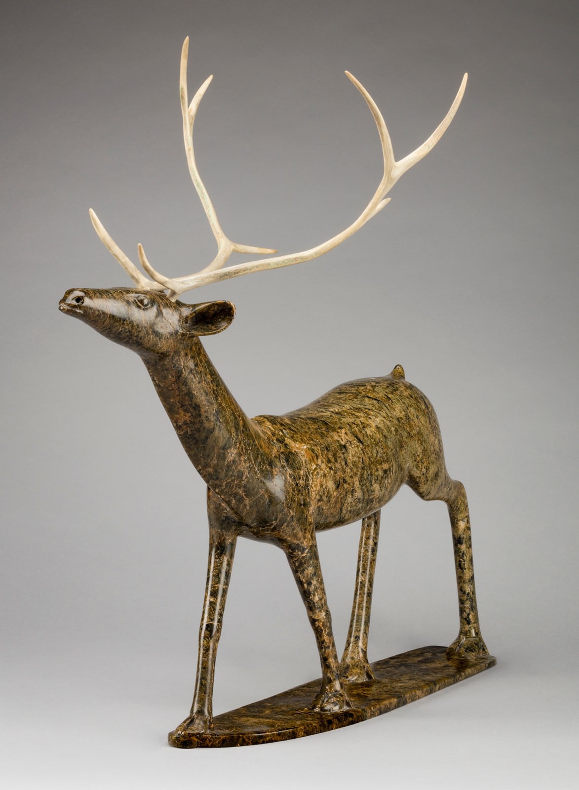 OSUITOK IPEELEE, R.C.A. (1922 or 1923-2005) KINNGAIT (CAPE DORSET, Walking Caribou, c. 1987-88