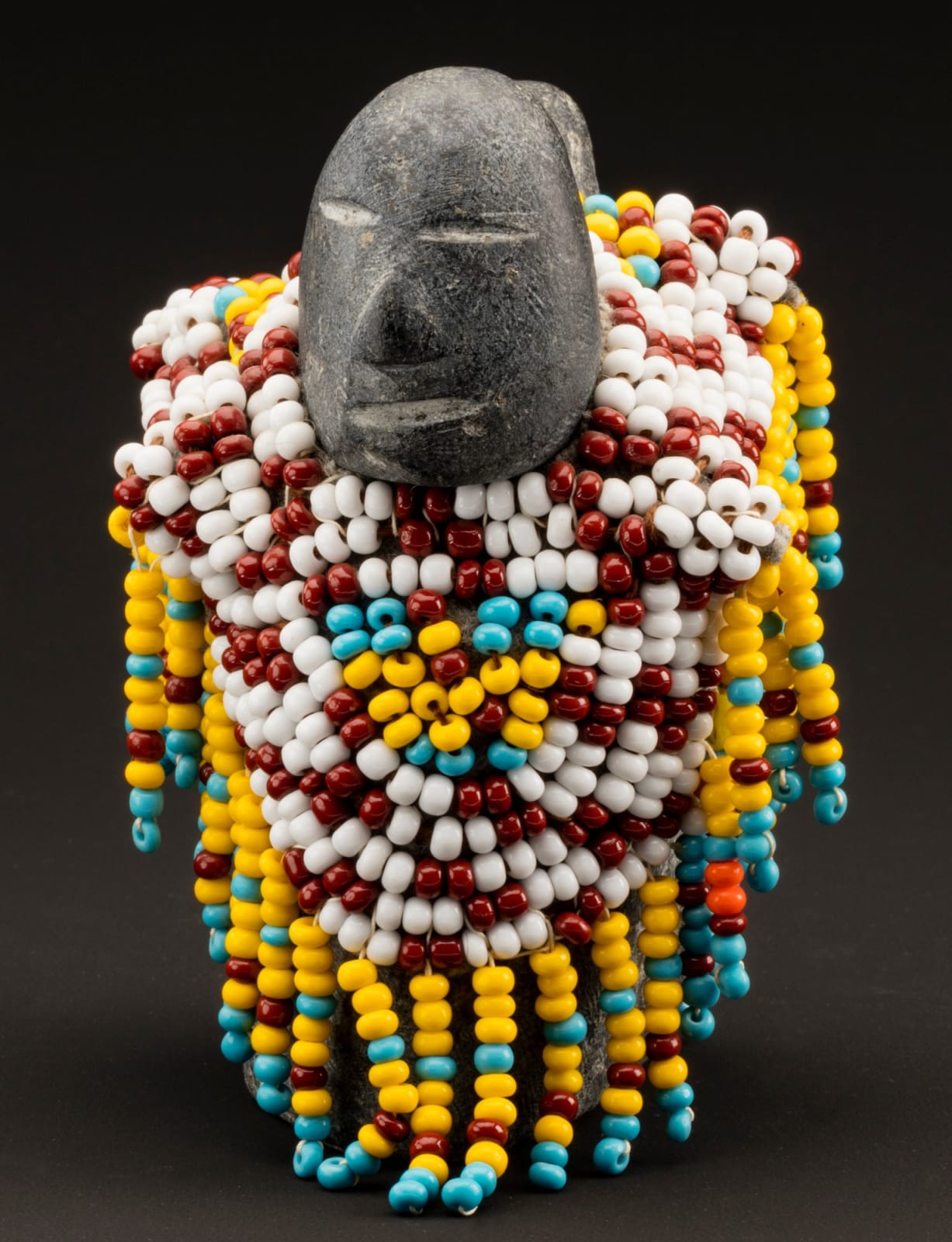 EVA TALOOKI ALIKTILUK (1927-1994) ARVIAT (ESKIMO POINT), Mother and Child in a Beaded Amautiq, c. 1990-91