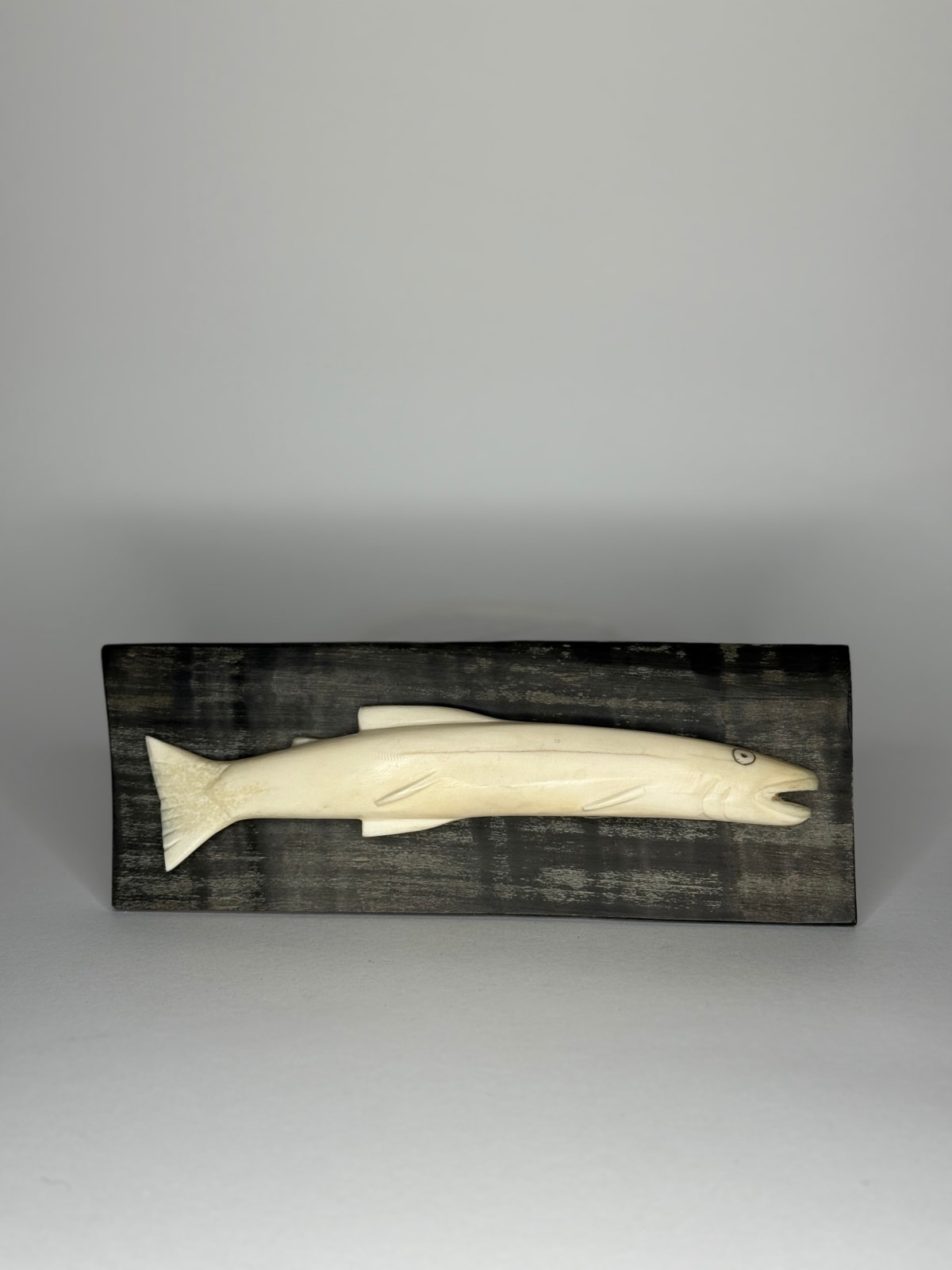 UNIDENTIFIED INUIT ARTIST, EASTERN CANADIAN ARCTIC, Fish on Plaque, 1970s