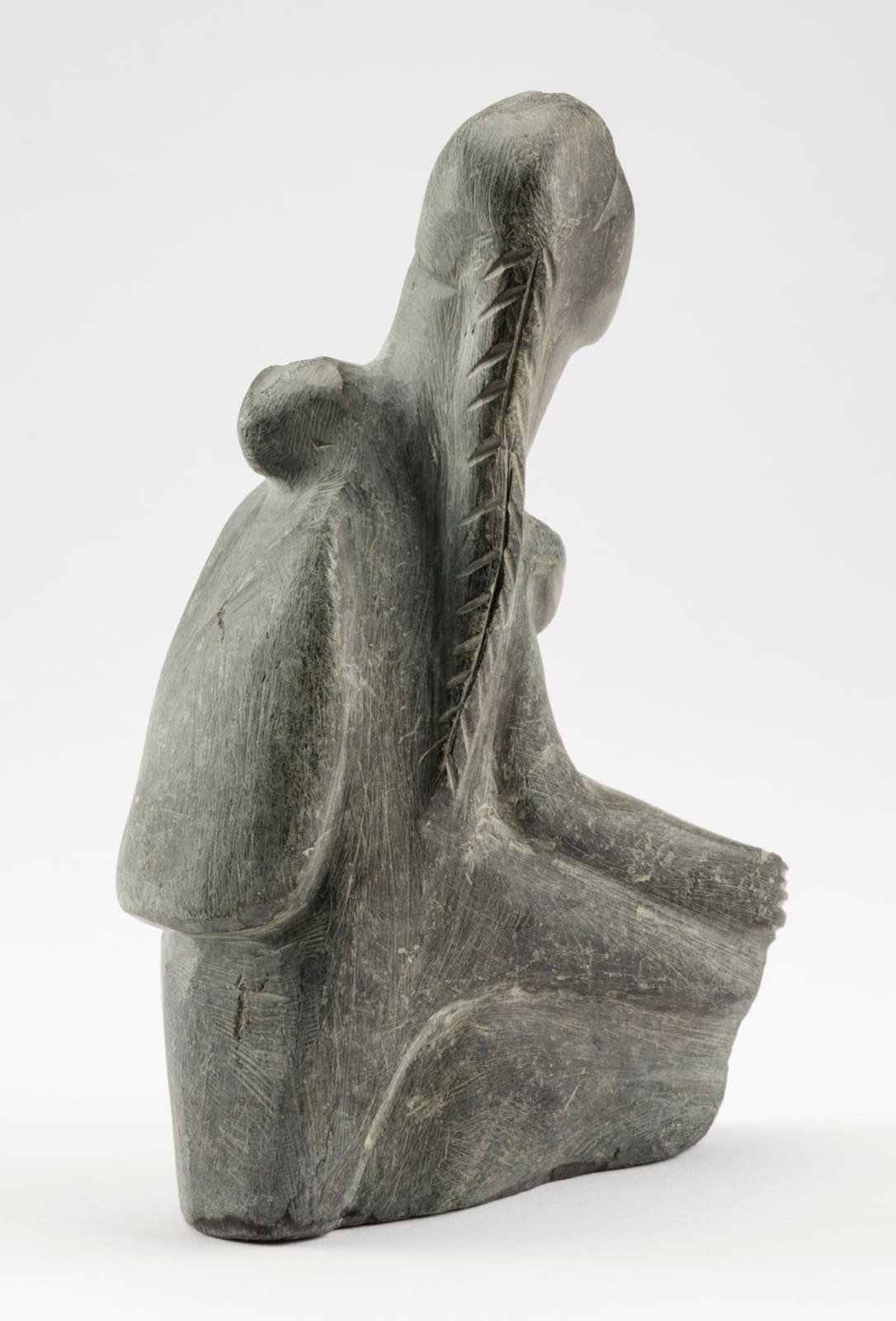 ELIZABETH NUTARAALUK AULATJUT (1914-1998) ARVIAT (ESKIMO POINT), Woman with Child, c. 1970-72