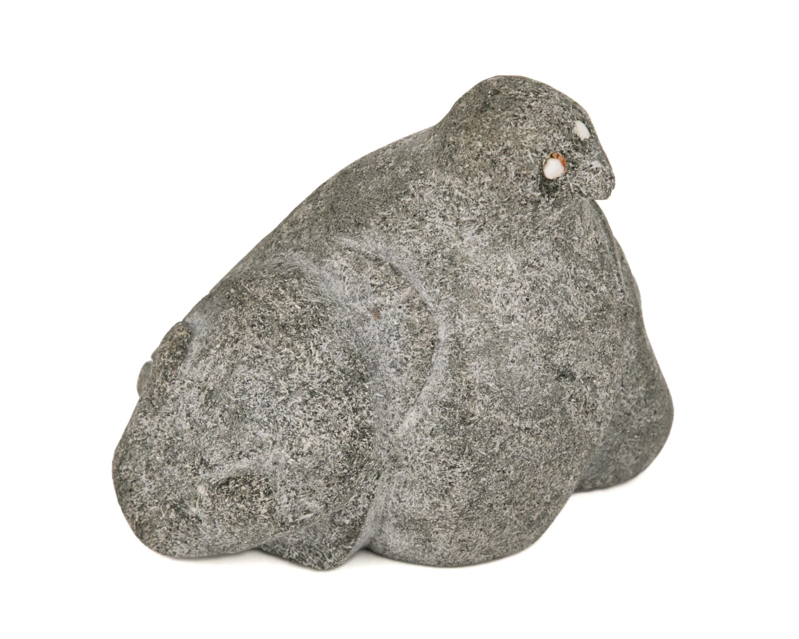 Attributed to PUDLO PUDLAT (1916-1992) KINNGAIT (CAPE DORSET), Arctic Trio: Owl, Tattooed Face, and Bear Head, c. 1950-55