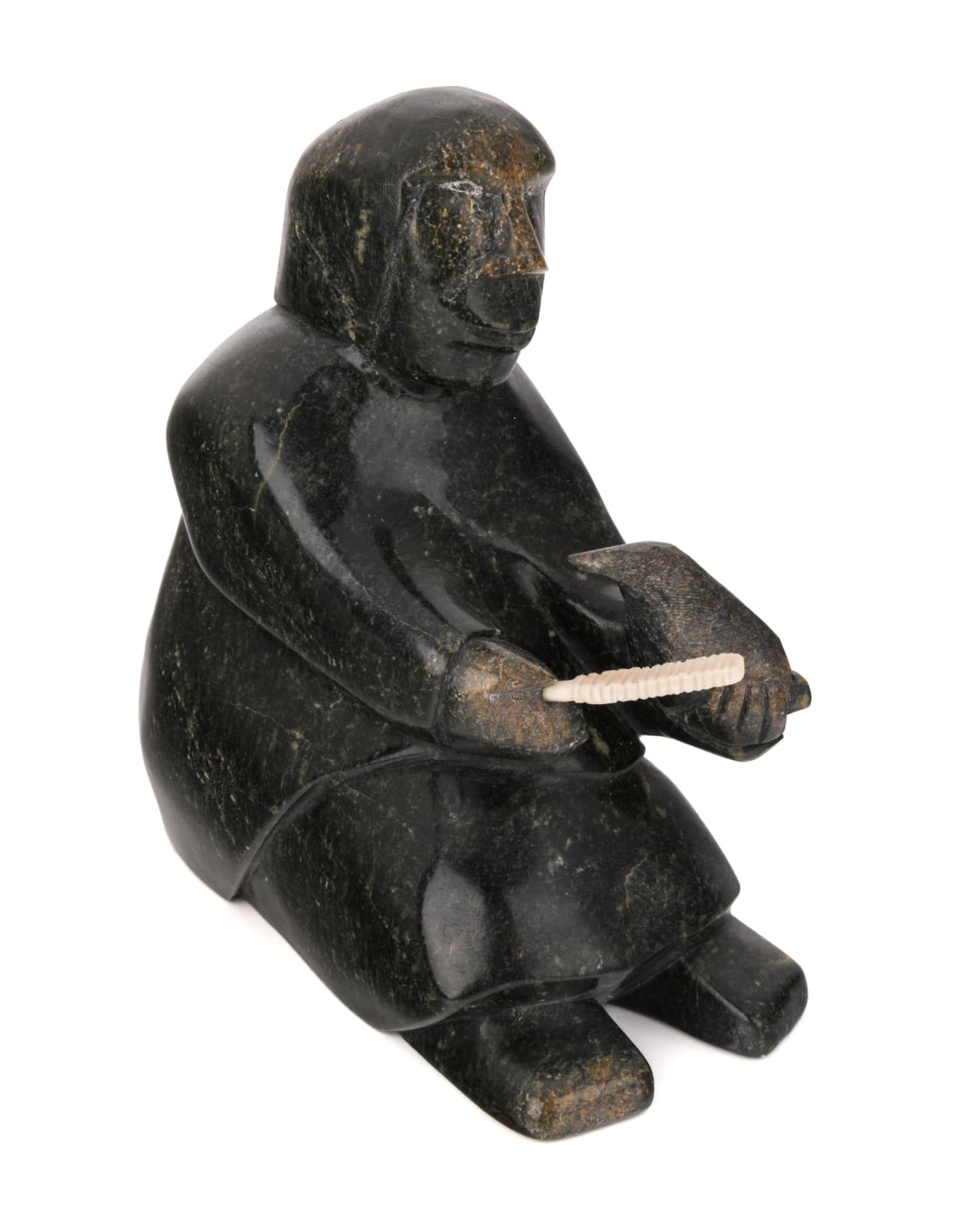 JOHNNY LEE PUDLAT (1971-) KINNGAIT (CAPE DORSET), Seated Carver with Rasp and Sculpture (Self Portrait?), 2000s