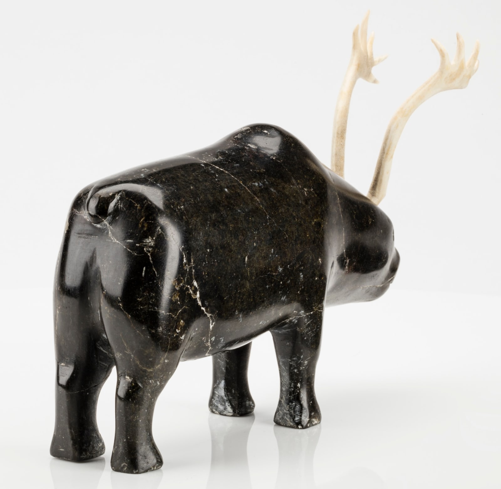 MARK TUNGILIK (1913-1986) NAUJAAT (REPULSE BAY), Standing Caribou, c. mid to late 1970s