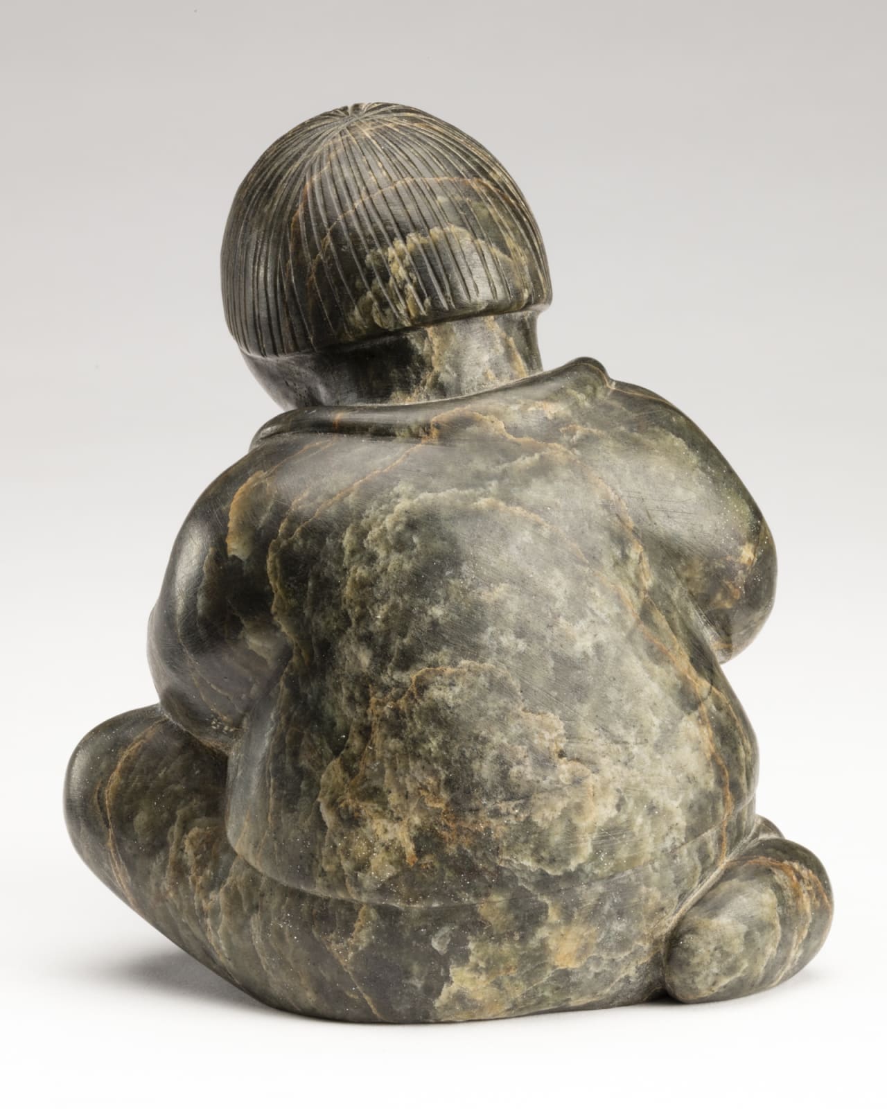 SIMON KASUDLUAK (1925-D) INUKJUAK (PORT HARRISON), Young Boy Skinning an Ermine, mid-late 1950s