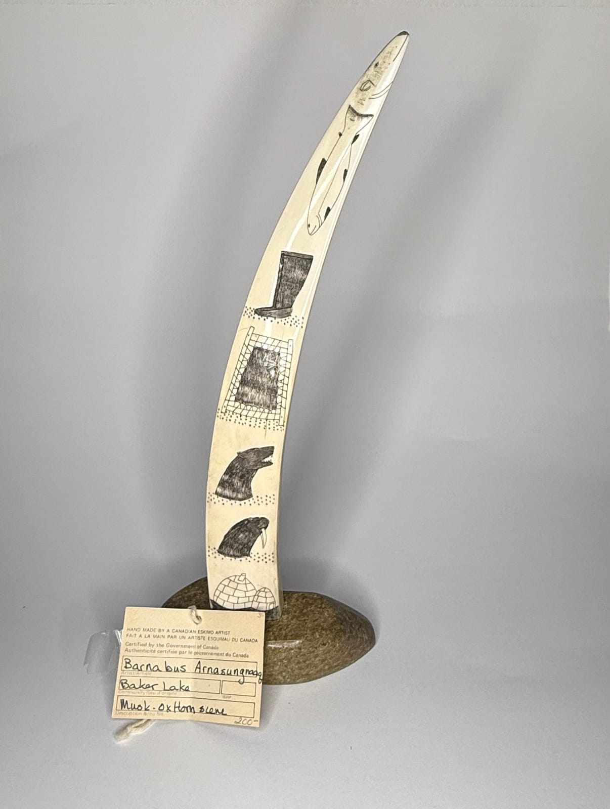 Possibly JOE ARLOOKTOO (1939-) KIMMIRUT (LAKE HARBOUR), Incised Tusk with Arctic Motifs, c. 1970