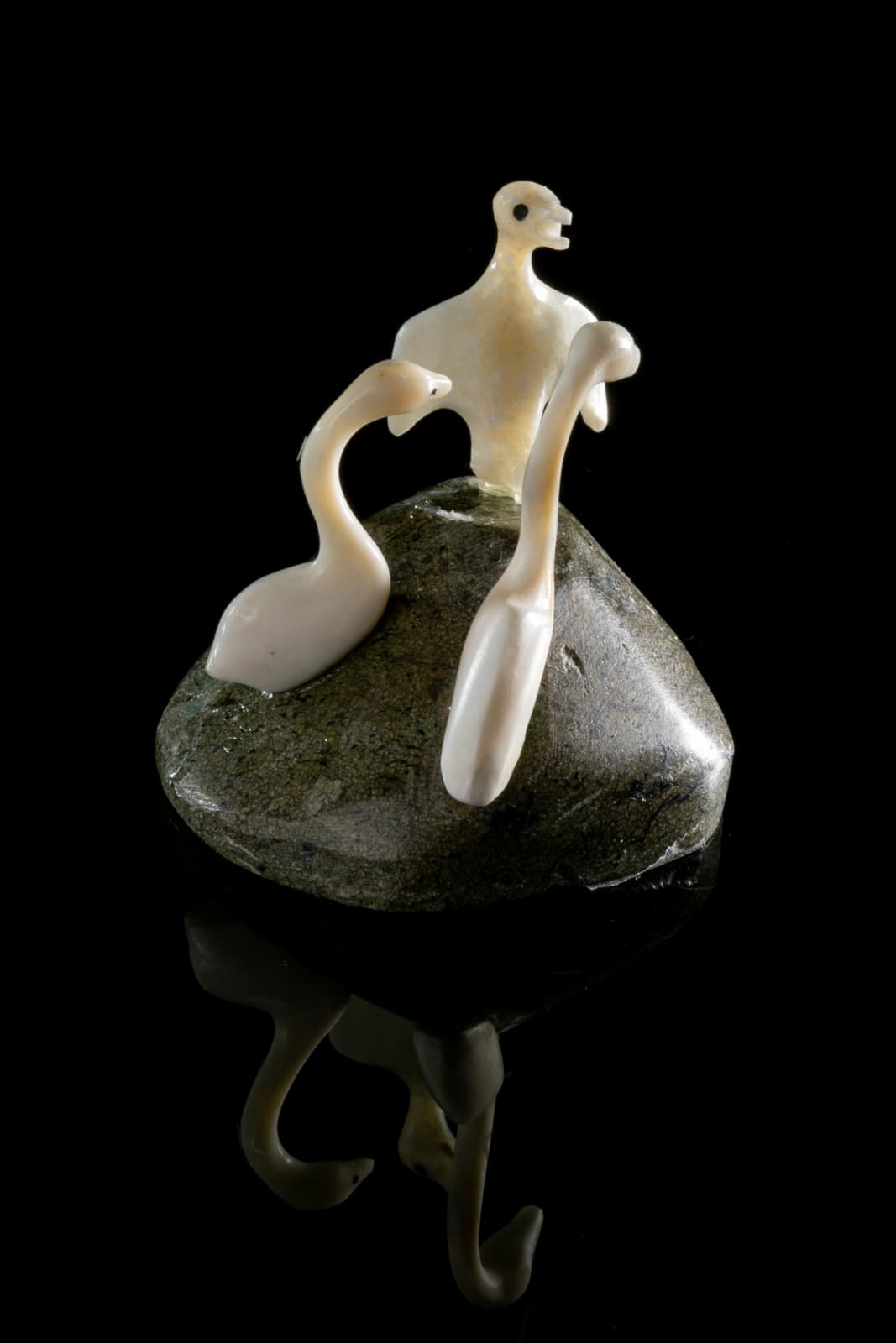 GIDEON QAUQJUAQ (1941-) TALOYOAK (SPENCE BAY), Three Birds on Base, 1970s or 1980s