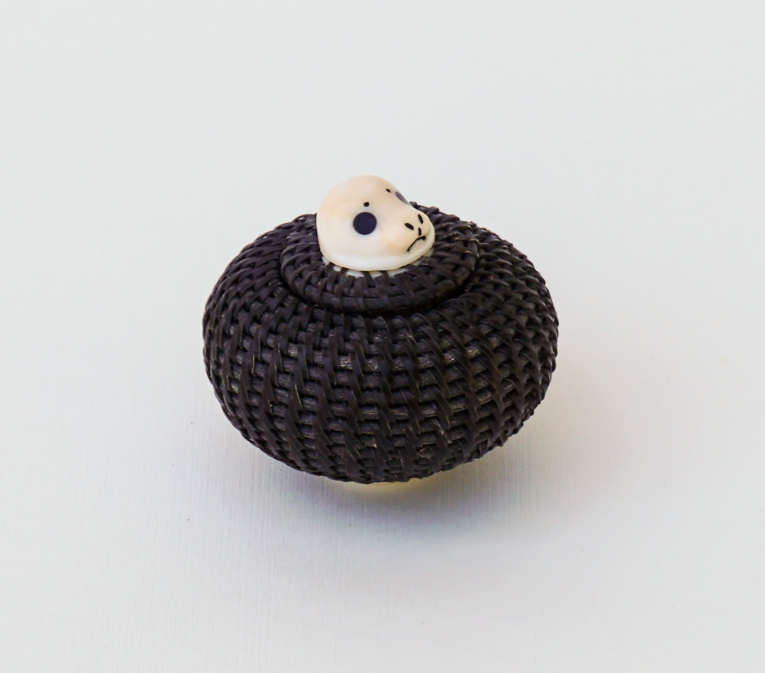 SHELDON BOGENRIFE (1953-) INUPIAQ, WAINWRIGHT, ALASKA, Basket with Seal Knob, 1980s