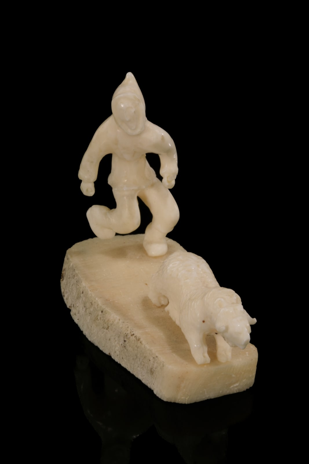 LUKE AIRUT (1942-2018) IGLULIK (IGLOOLIK), Hunter in Pursuit of a Muskox