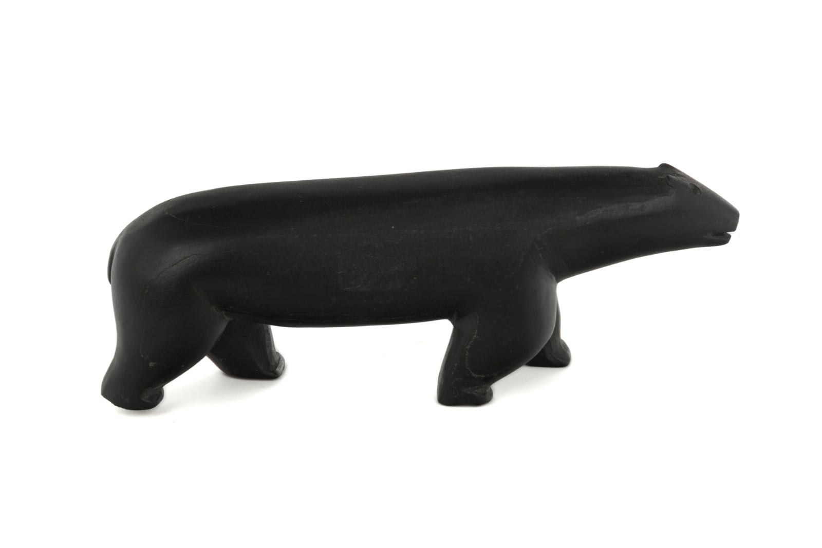 UNIDENTIFIED ARTIST, EASTERN CANADIAN ARCTIC, Striding Polar Bear, mid-late 1950s