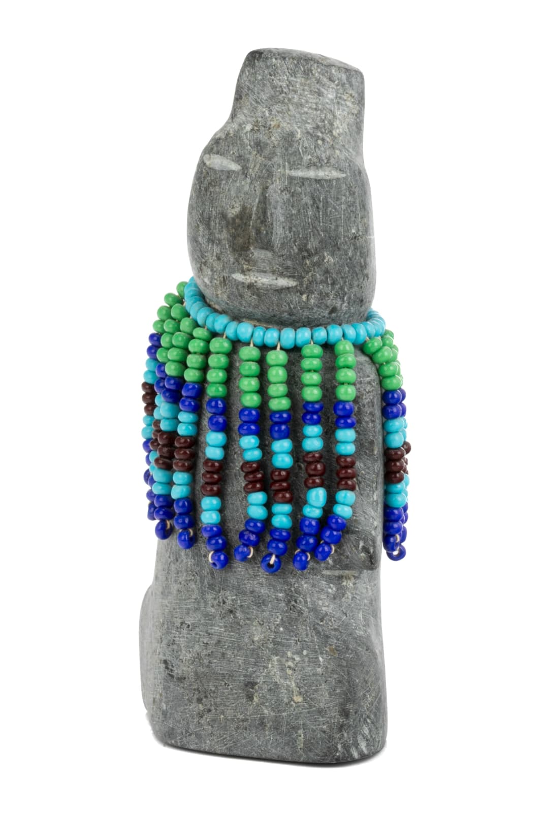 EVA TALOOKI ALIKTILUK (1927-1994) ARVIAT (ESKIMO POINT), Woman in a Beaded Amautiq with Coiffed Hair