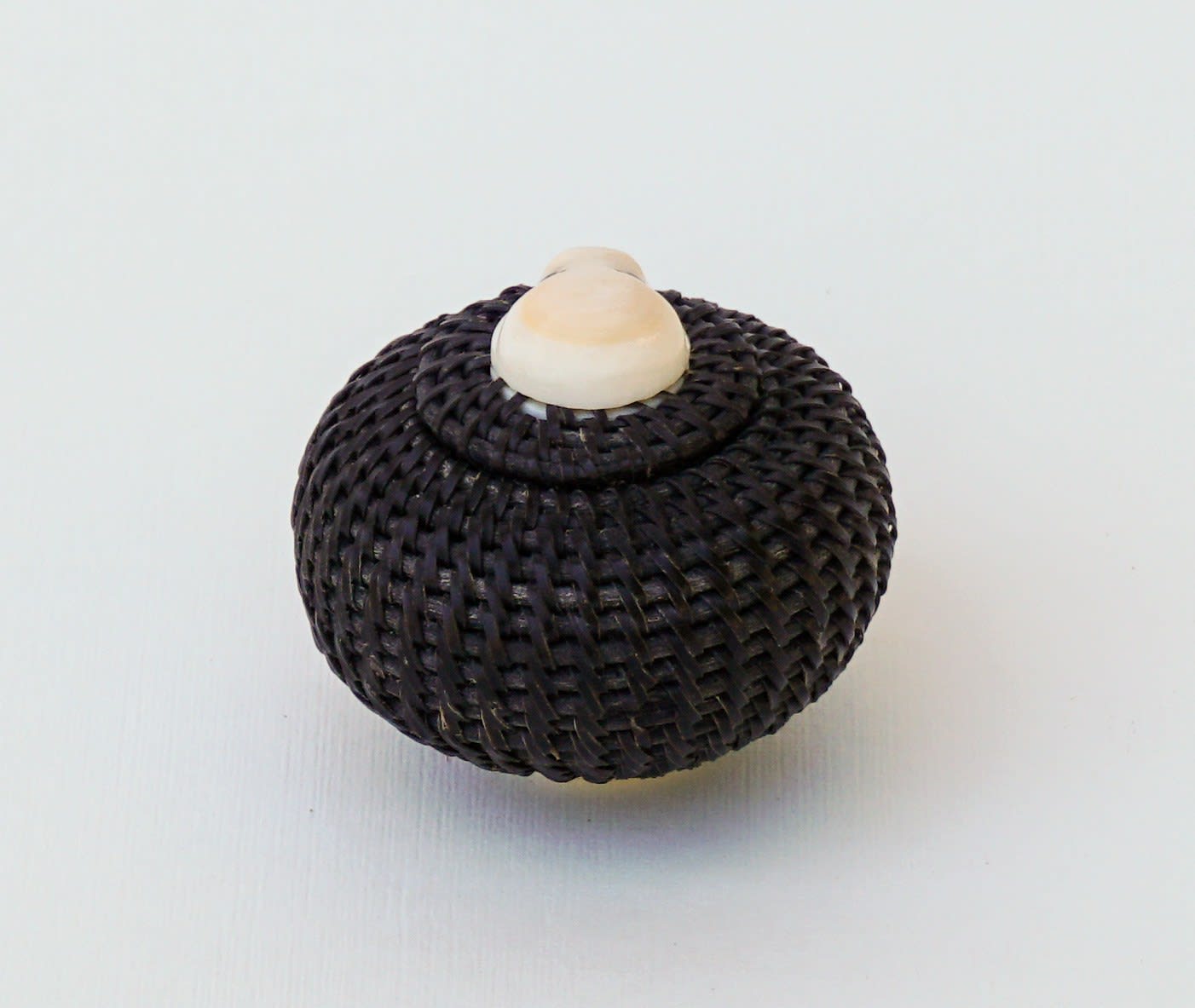 SHELDON BOGENRIFE (1953-) INUPIAQ, WAINWRIGHT, ALASKA, Basket with Seal Knob, 1980s