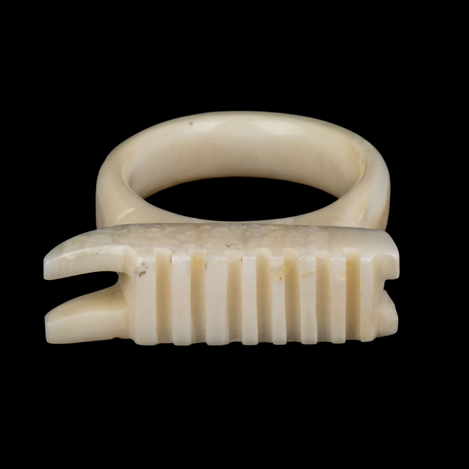 UNIDENTIFIED INUIT ARTIST, PANNIQTUUQ (PANGNIRTUNG), Qamutiik (Komatik) Ring, c. 1980s