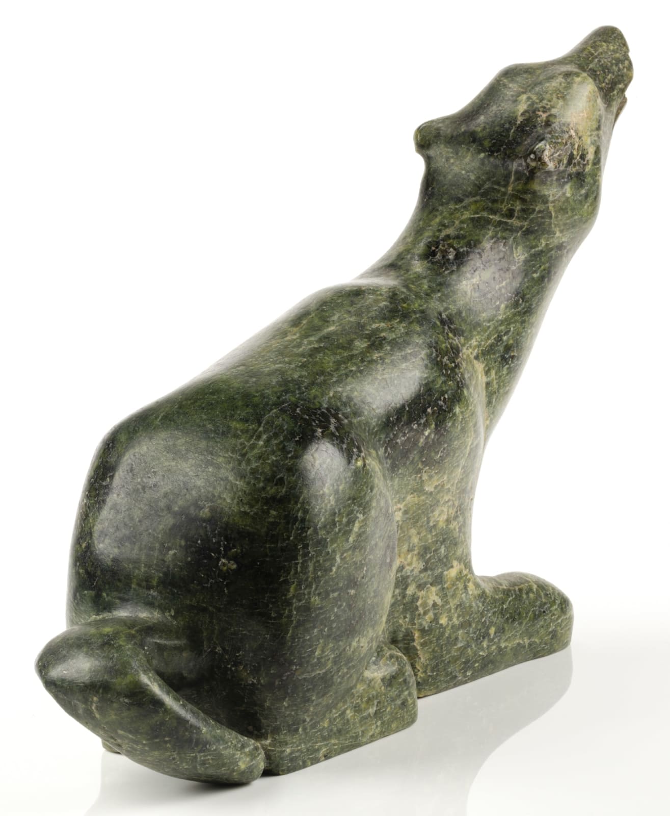 Attributed to: KIUGAK (KIAWAK) ASHOONA, O.C., R.C.A. (1933-2014) KINNGAIT (CAPE DORSET), Seated Howling Dog, c. early 1960s