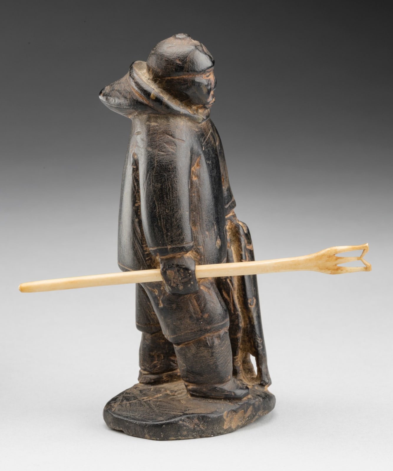 ENNUTSIAK (1893-1967) IQALUIT (FROBISHER BAY), Kakivak Fisherman with Catch,, early 1960s