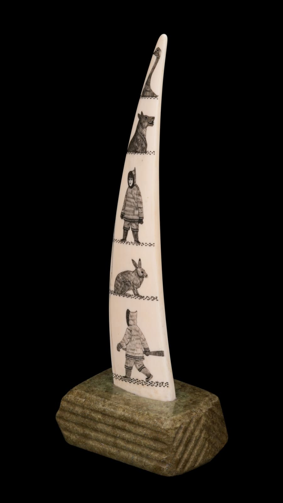 DAVIDEE ITULU (1929-2006) KIMMIRUT (LAKE HARBOUR), Incised Tusk with Inuit and Arctic Animals, mid-late 1970s