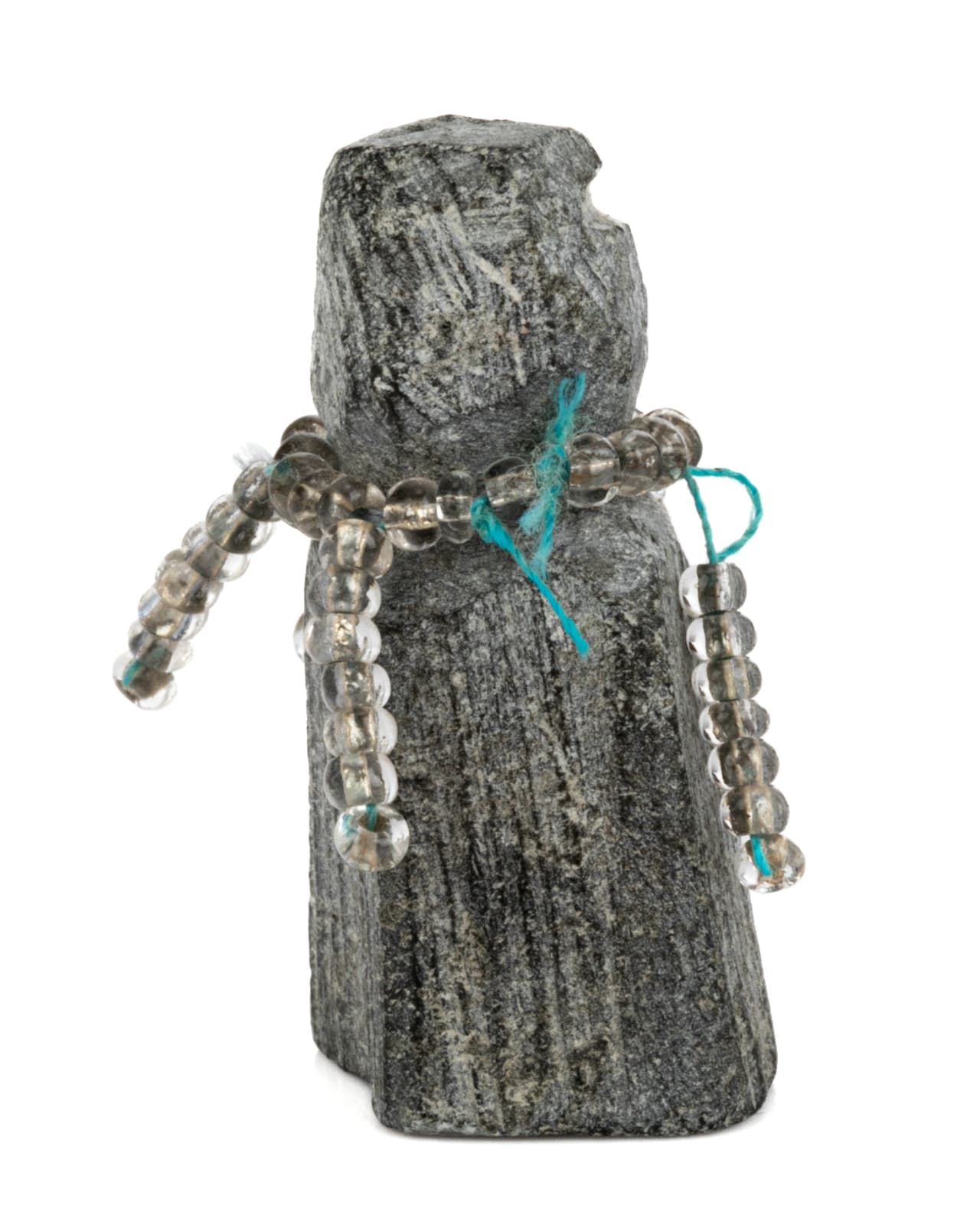 EVA TALOOKI ALIKTILUK (1927-1994) ARVIAT (ESKIMO POINT), Woman in a Silver Beaded Amautiq