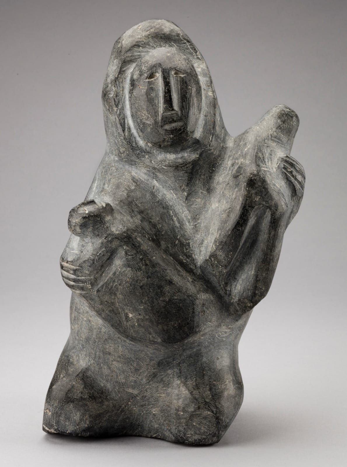 ELIZABETH NUTARAALUK AULATJUT (1914-1998) ARVIAT (ESKIMO POINT), Mother with Two Children, 1974