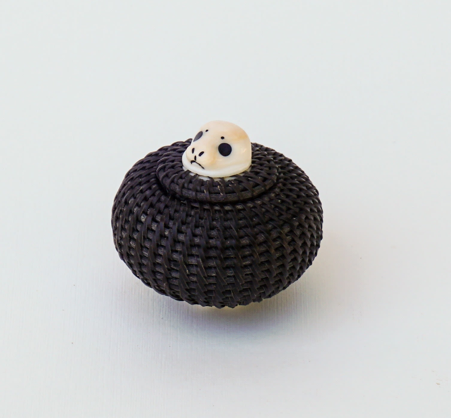 SHELDON BOGENRIFE (1953-) INUPIAQ, WAINWRIGHT, ALASKA, Basket with Seal Knob, 1980s