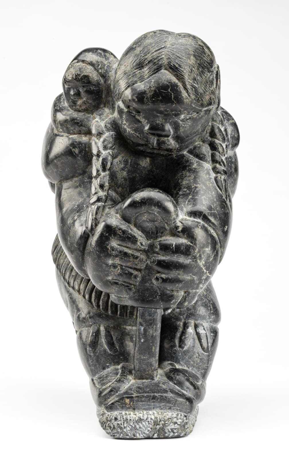JOHNNY INUKPUK, R.C.A. (1911-2007) INUKJUAK (PORT HARRISON), Mother with Child, Stretching a Kamik, early 1960s