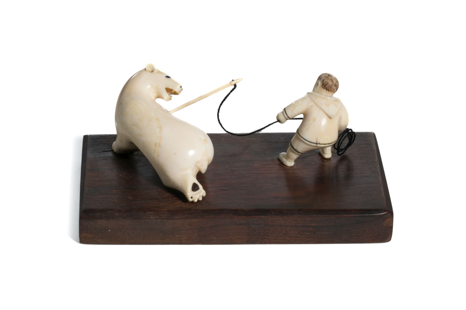 UNIDENTIFIED INUIT ARTIST, EASTERN CANADIAN ARCTIC, Hunter and Polar Bear, c. late 1940s / early 1950s