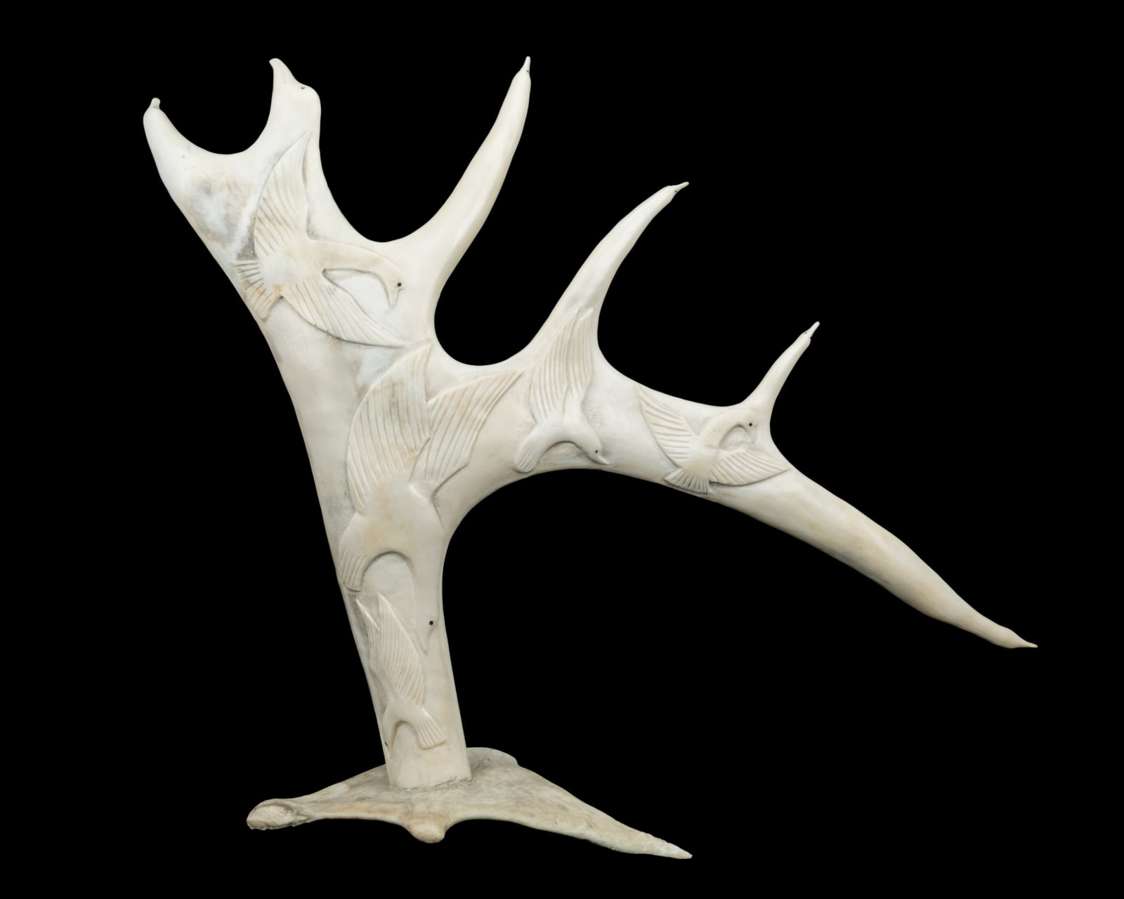 YASSIE DANIALEE KAKEE (1947-) IQALUIT (FROBISHER BAY), Still Flight (Birds in Relief on Antler), c. 1990s