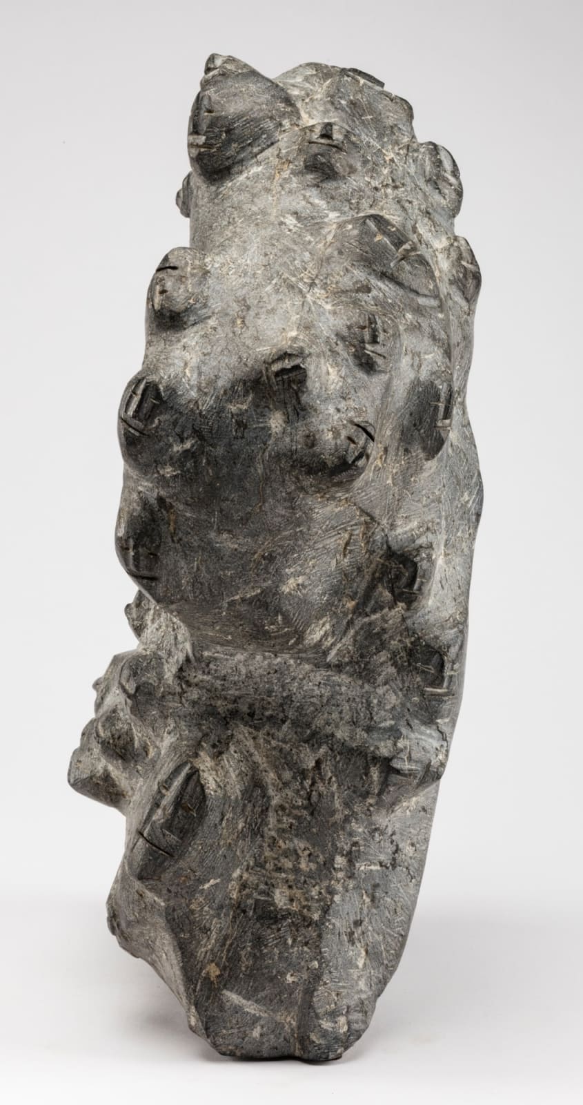 LUCY TASSEOR TUTSWEETOK (1934-2012) ARVIAT (ESKIMO POINT), Many Faces, late 1970s