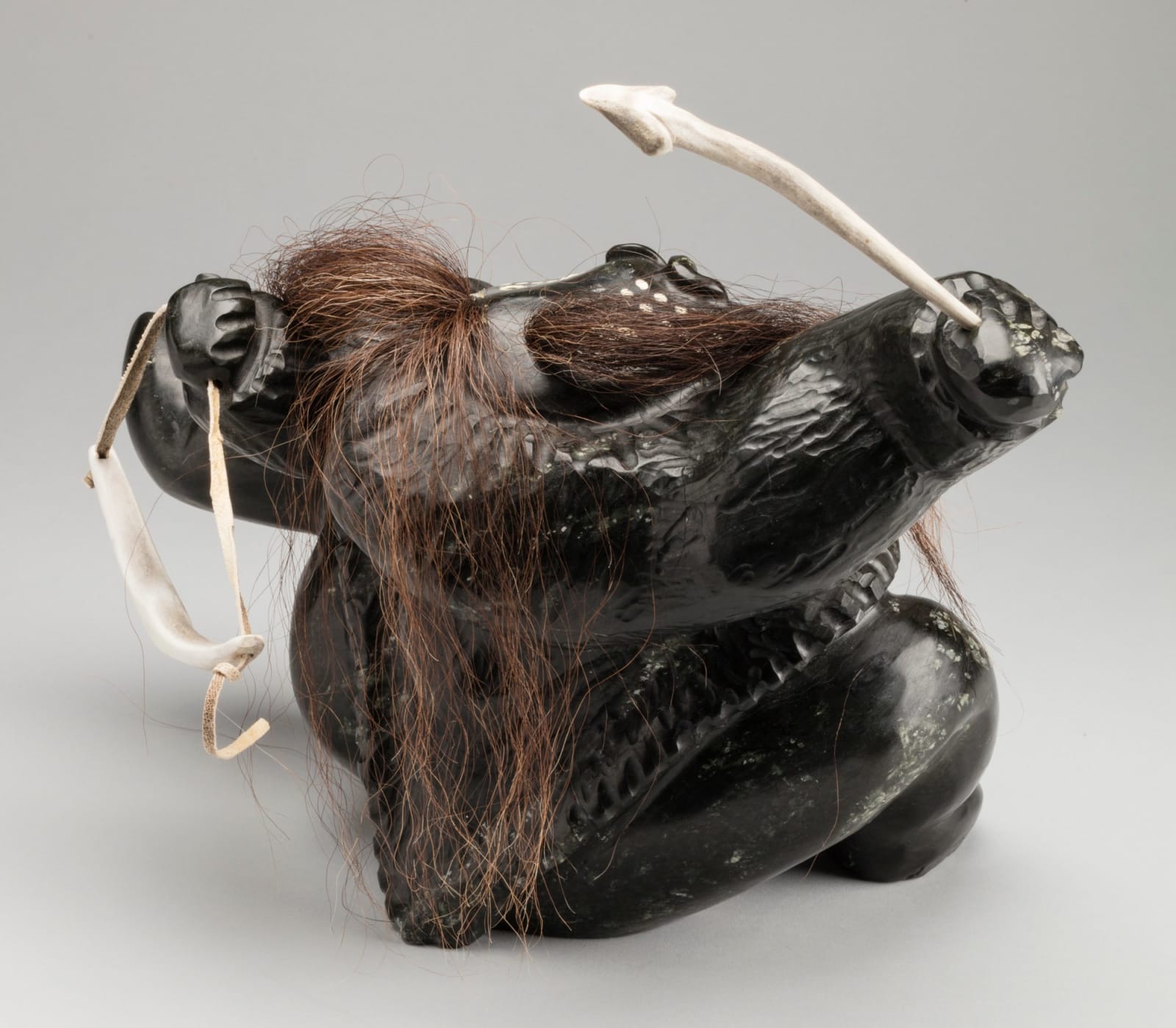 URIASH PUQIQNAK (1946-) UQSUQTUUQ (GJOA HAVEN), Female Hunter with Bow and Arrow, 2010