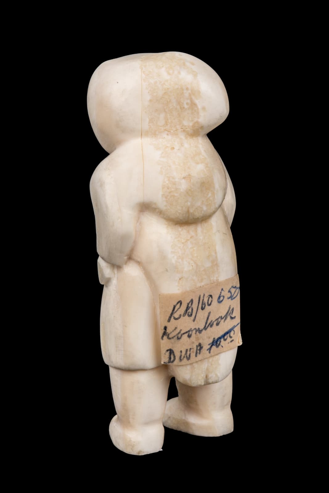 KOONLOOK, NAUJAAT (REPULSE BAY), Plump-Cheeked Figure in an Amautiq, 1960