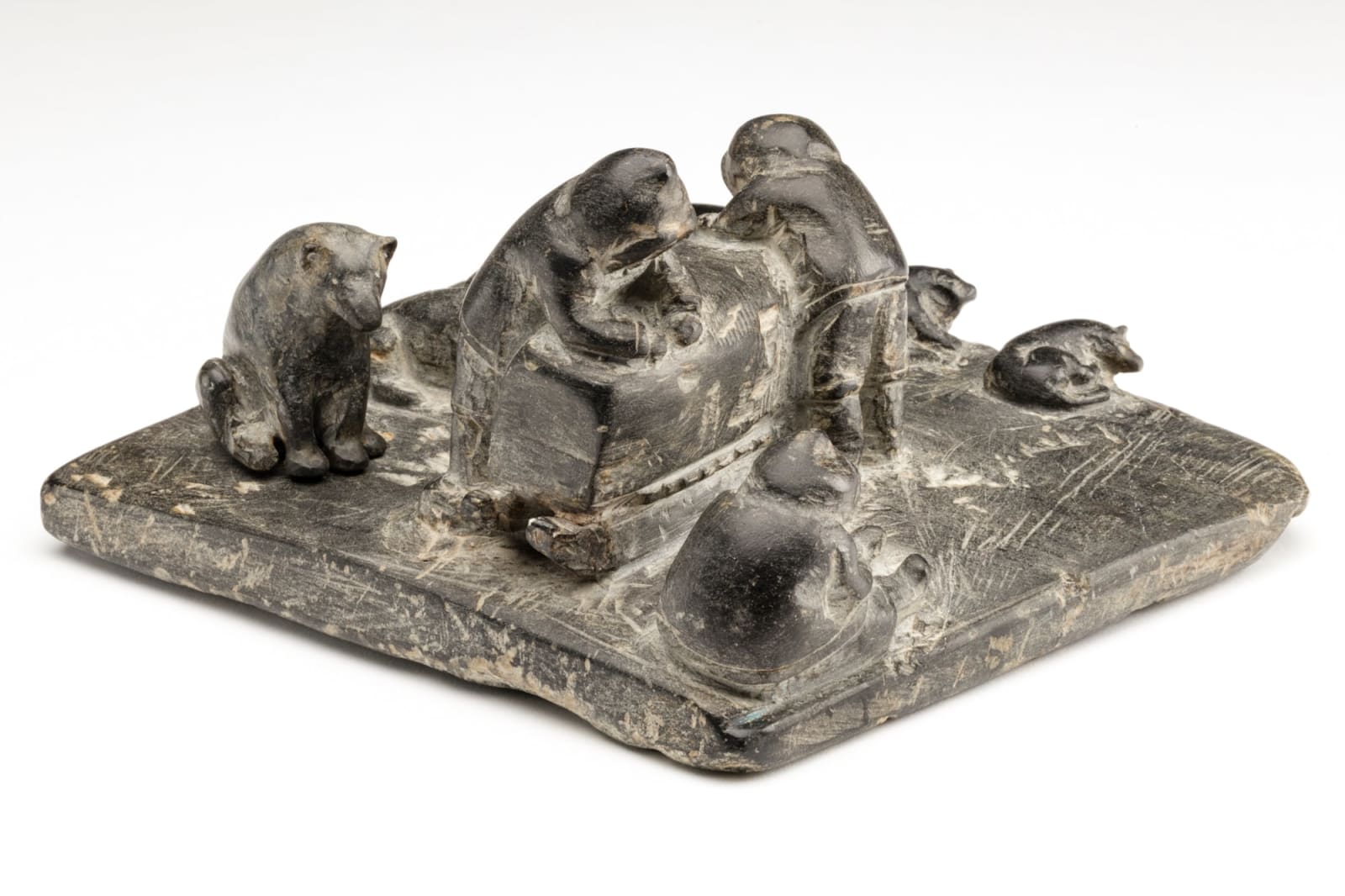 ENNUTSIAK (1893-1967) IQALUIT (FROBISHER BAY), Hunters with Qamutiq and Dogs, early 1960s