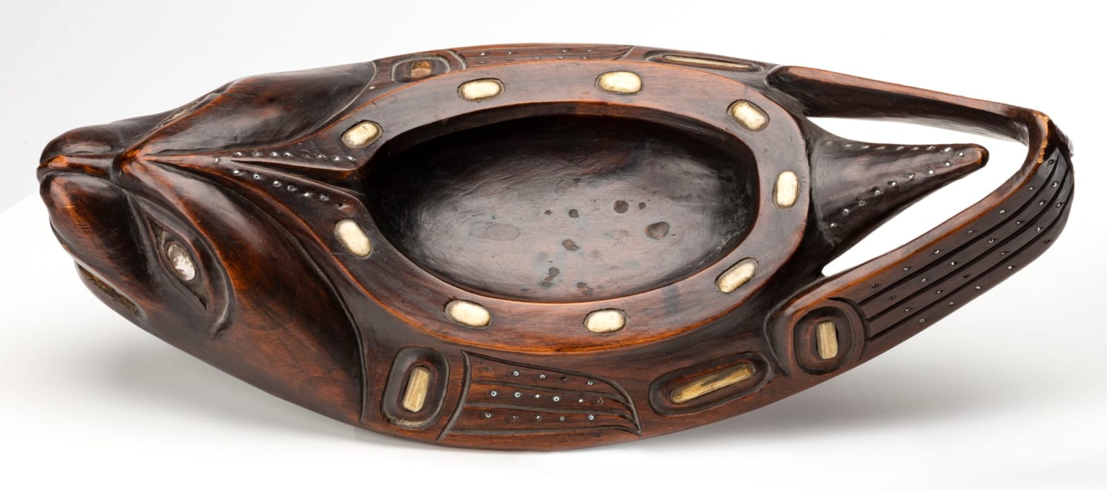 POSSIBLY RUDOLPH WALTON (1867-1951) OR A FOLLOWER, TLINGIT, SITKA, ALASKA, Seal Form Grease Bowl, c. 1920