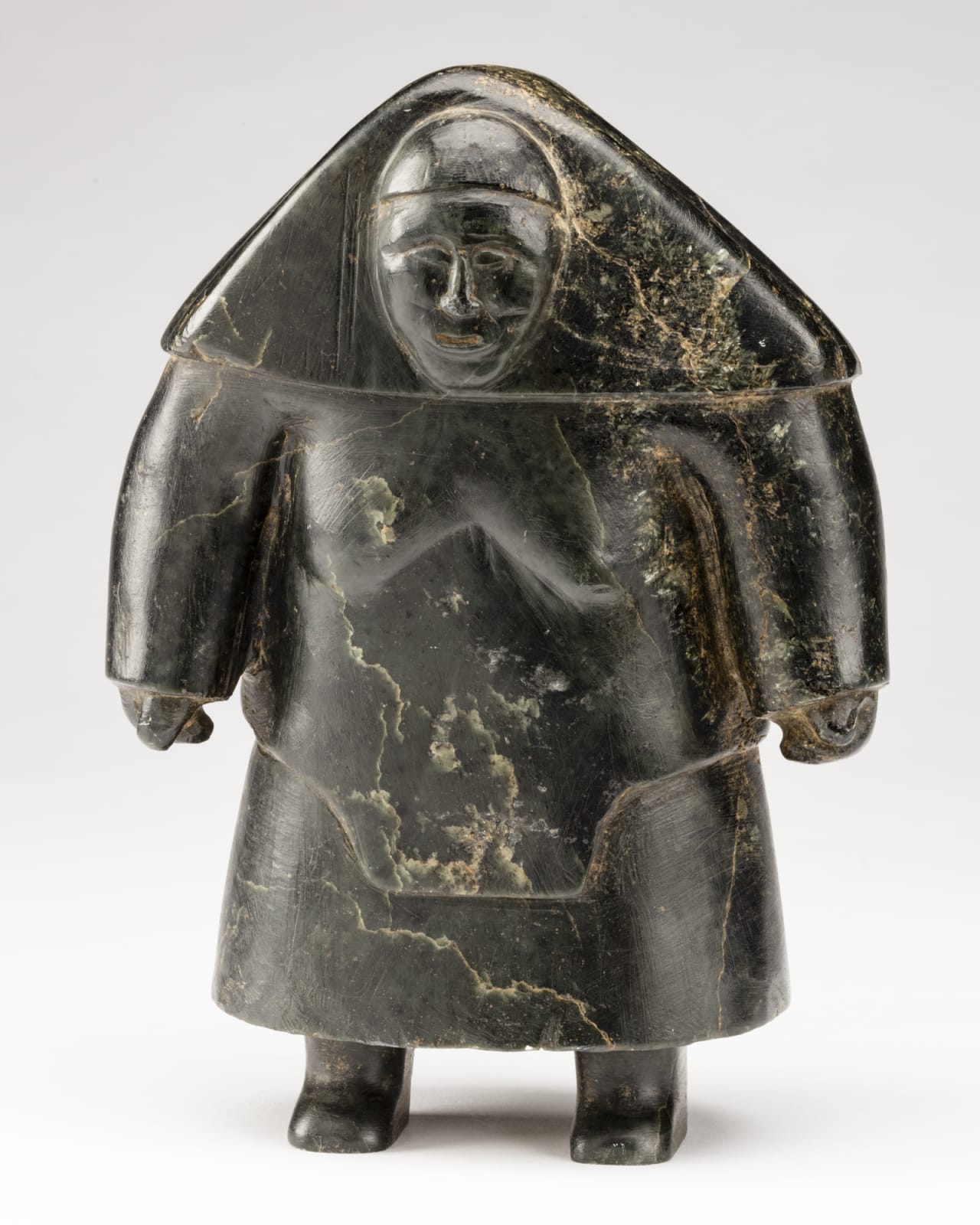 CONLUCY NAYOUMEALOOK (1891-1958) INUKJUAK (PORT HARRISON), Standing Woman in an Amautiq, mid-1950s