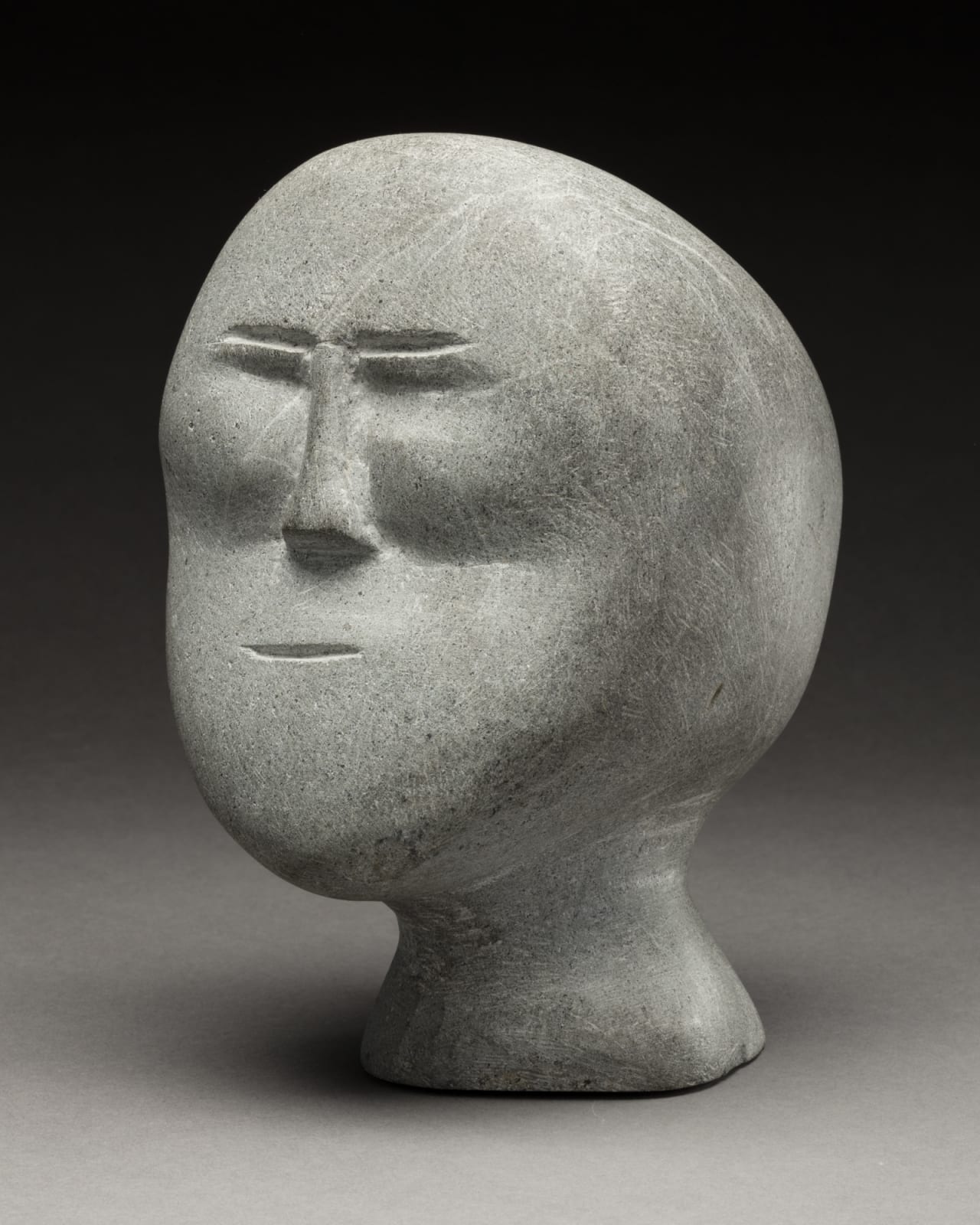 JOHN TIKTAK, R.C.A. (1916-1981) KANGIQLINIQ (RANKIN INLET), Head, c. 1964-5