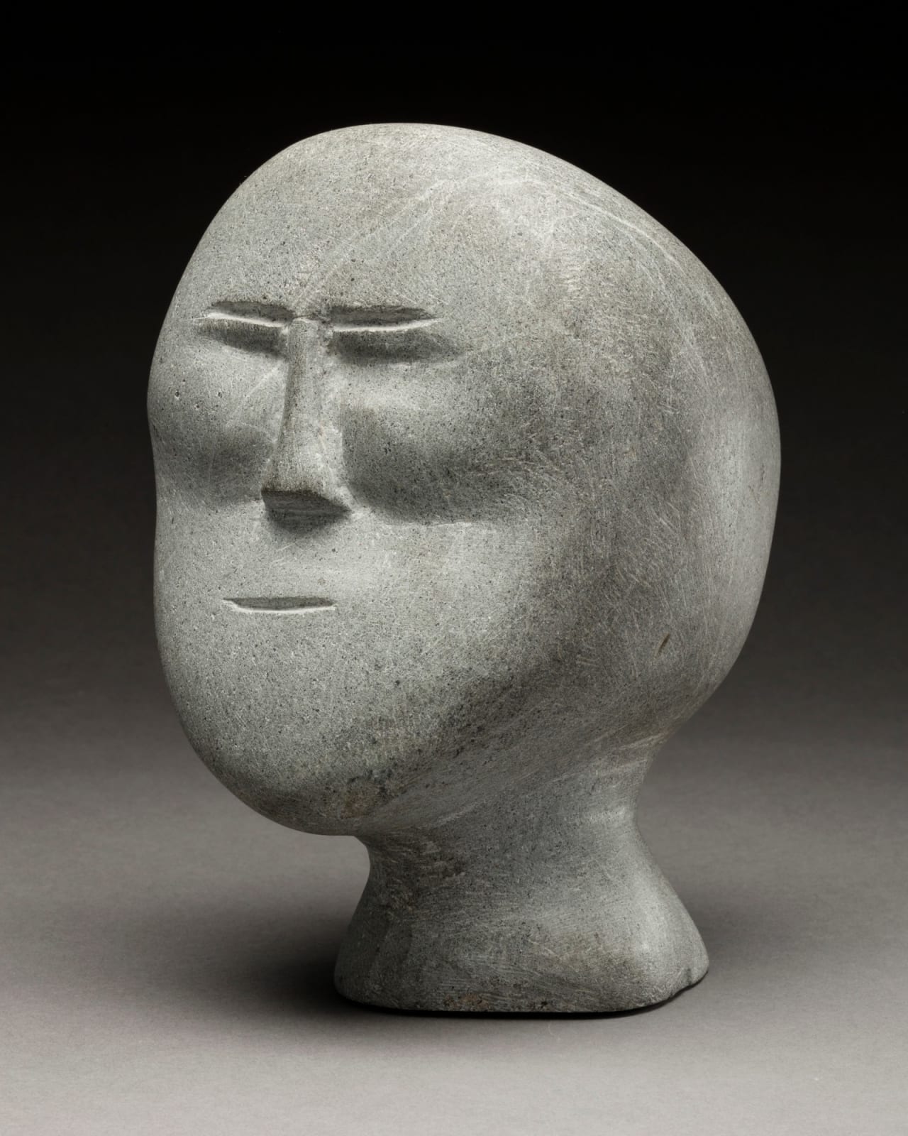 JOHN TIKTAK, R.C.A. (1916-1981) KANGIQLINIQ (RANKIN INLET), Head, c. 1964-65