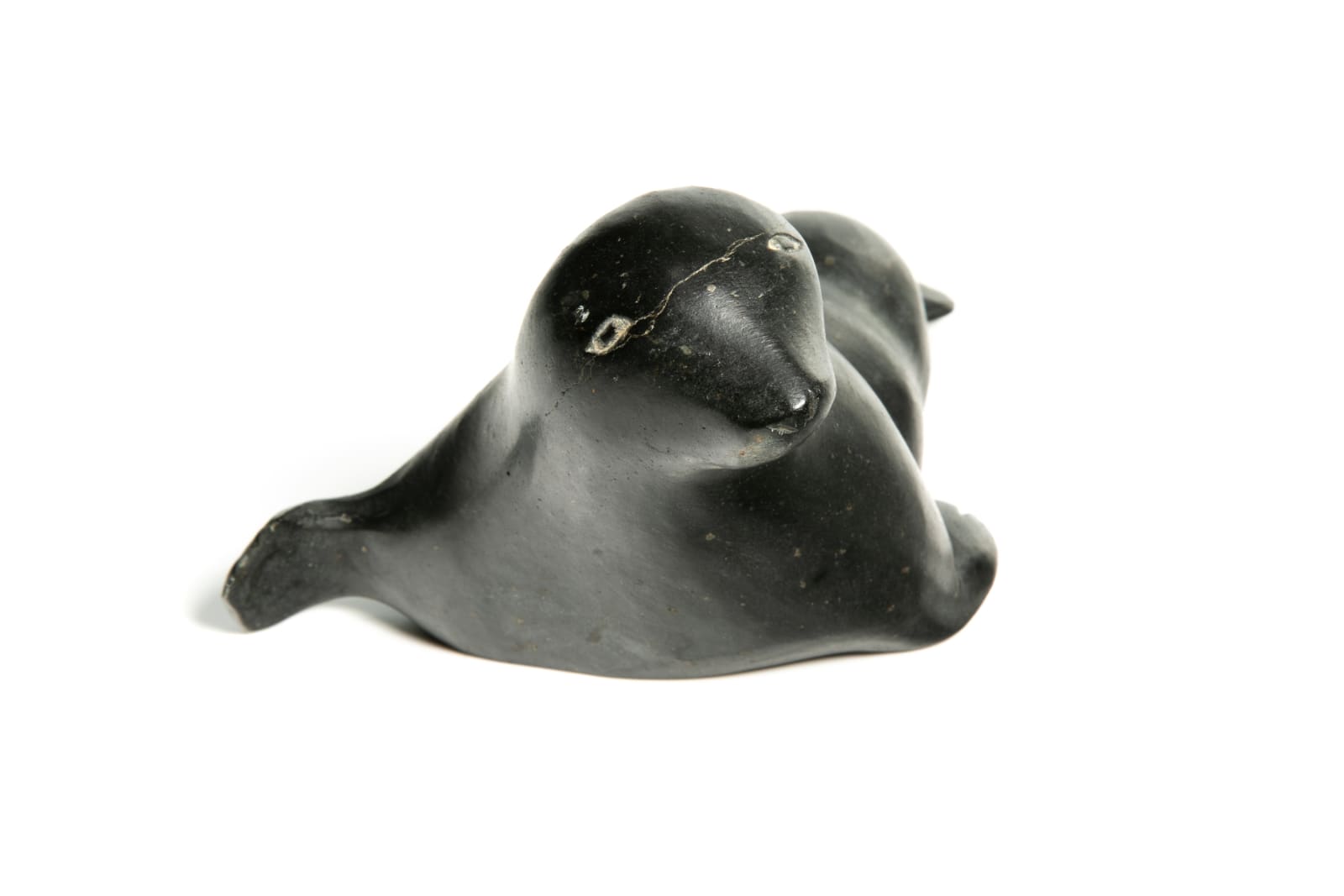 DAVID ARNASUNGAAQ (1964-) QAMANI'TUAQ (BAKER LAKE), Lounging Seal, c. 1990