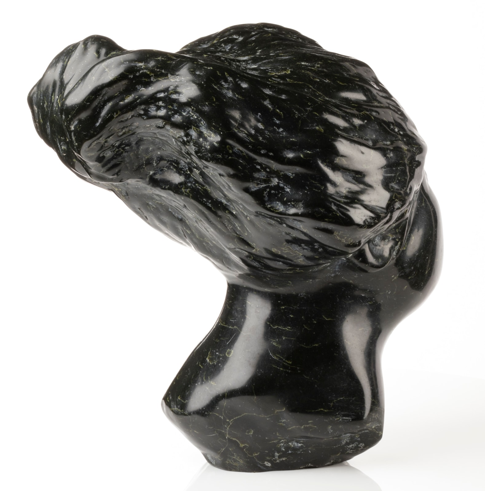 HENRY EVALUARDJUK (1923-2007) IQALUIT (FROBISHER BAY), Head of an Woman with Billowing Hair, 1975