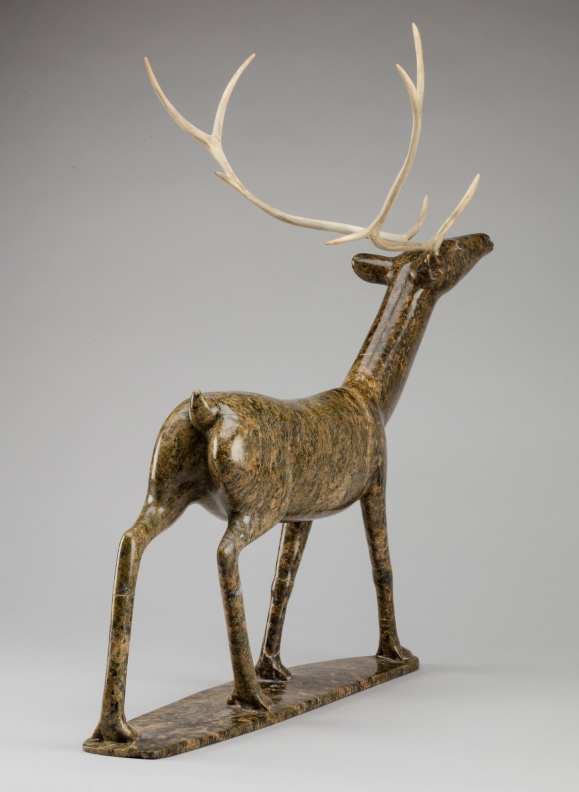 OSUITOK IPEELEE, R.C.A. (1922 or 1923-2005) KINNGAIT (CAPE DORSET, Walking Caribou, c. 1987-88