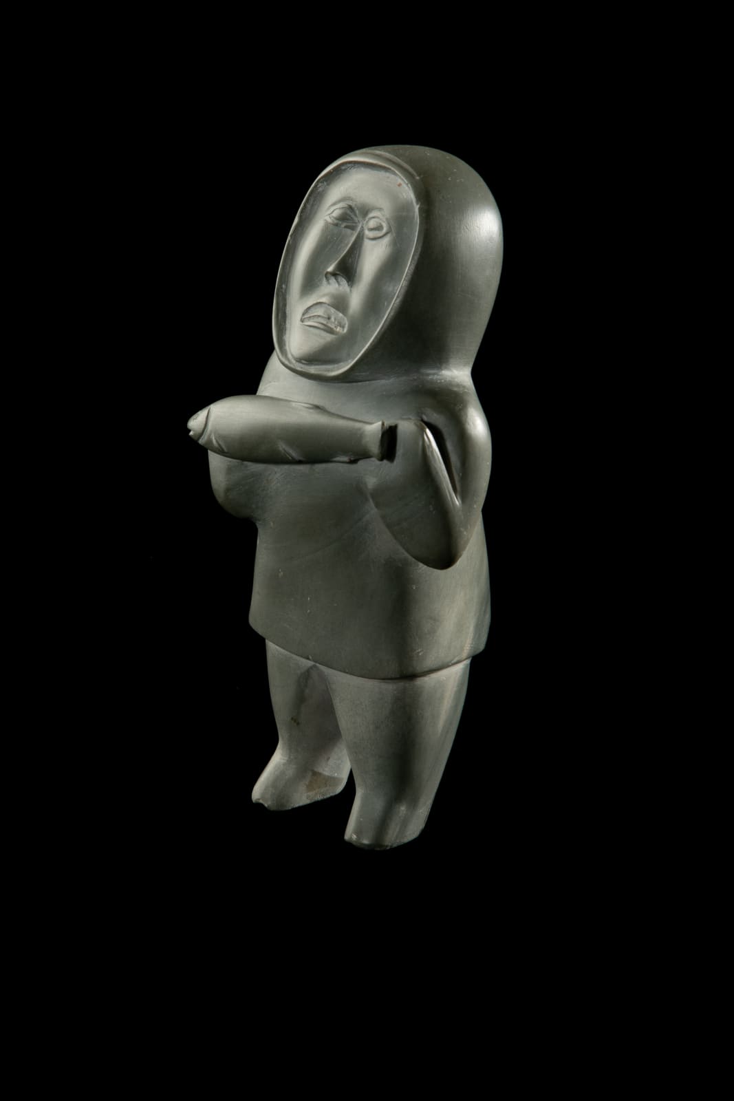 UNIDENTIFIED ARTIST, possibly SANIKILUAQ (BELCHER ISLAND), Standing Hunter with Caught Fish, 1960s