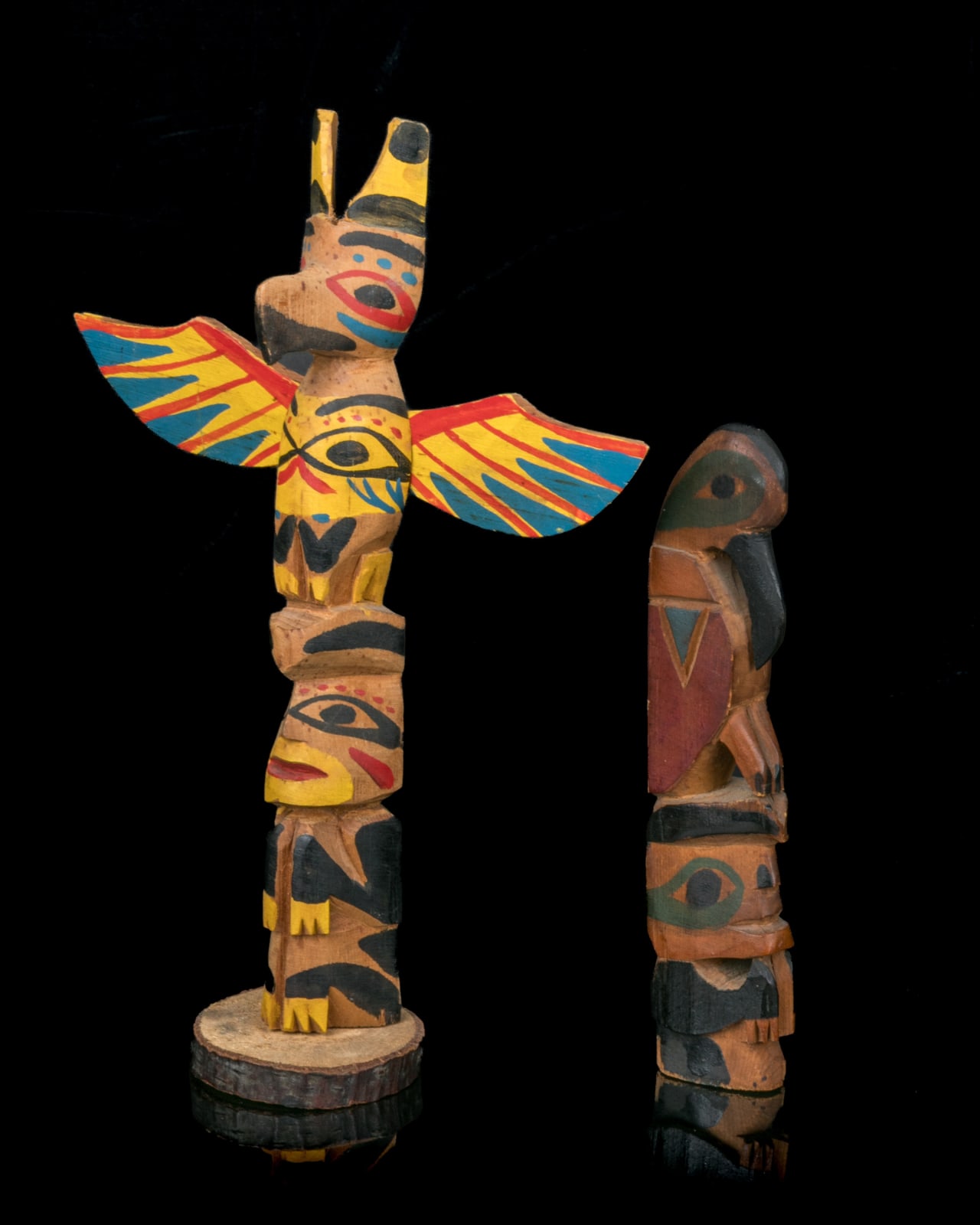 UNKNOWN NUU-CHAH-NULTH CARVERS, Two Model Totem Poles, c. 1930s / 1940s