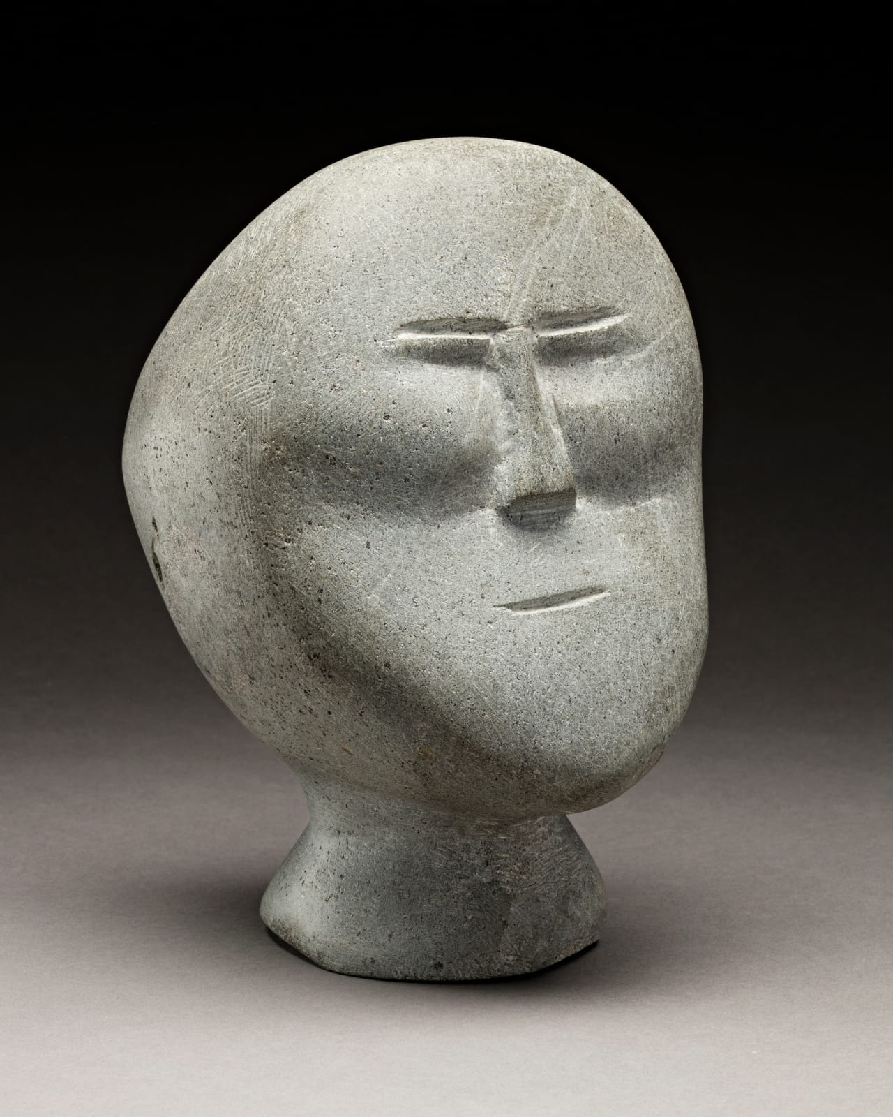 JOHN TIKTAK, R.C.A. (1916-1981) KANGIQLINIQ (RANKIN INLET), Head, c. 1964-65