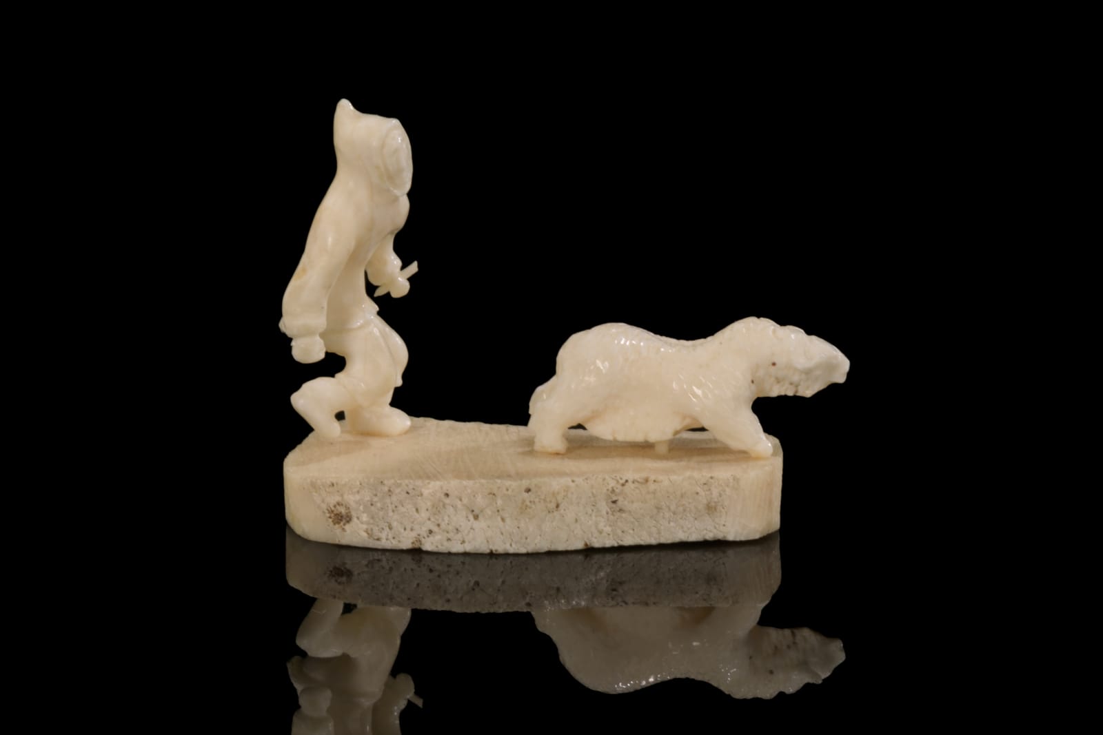 LUKE AIRUT (1942-2018) IGLULIK (IGLOOLIK), Hunter in Pursuit of a Muskox