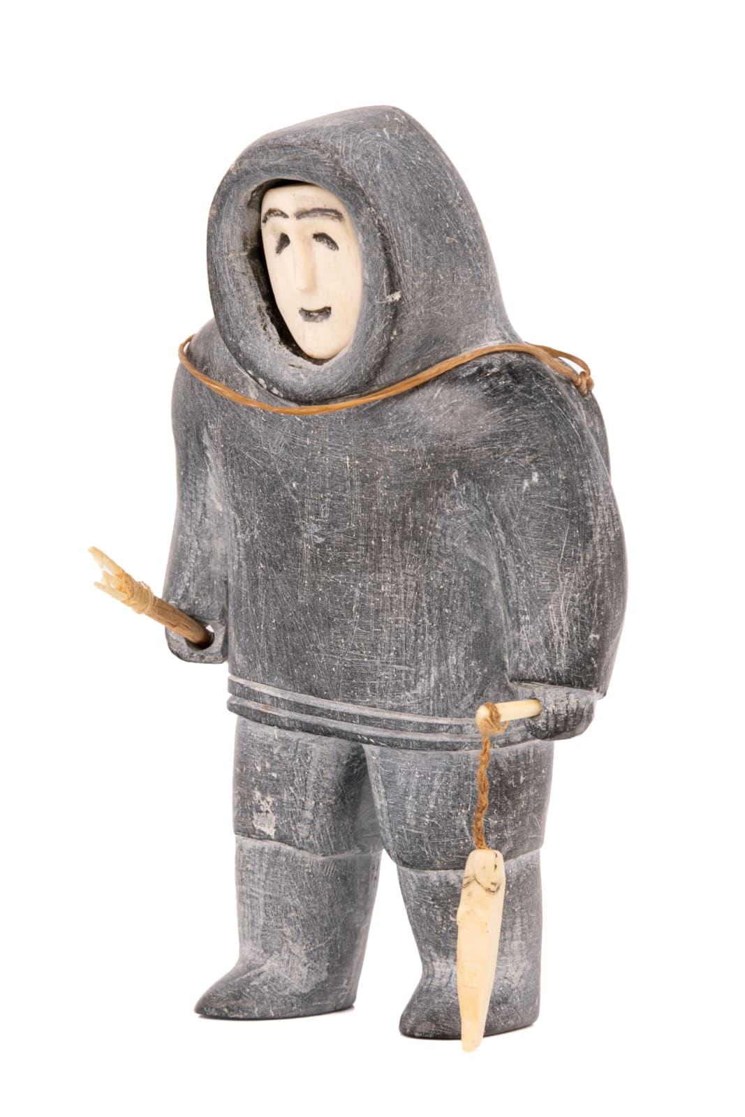 UNIDENTIFIED INUIT ARTIST, NUNAVIK (ARCTIC QUEBEC), Fisherman Setting Out with a Heavy Pack, mid-late 1950s